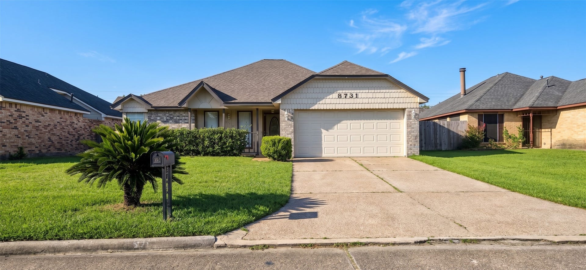8731 Croteau Drive, Houston, TX 77044 Welcome home to this charming single-story brick home with great curb appeal. Highlights include a lush, manicured front lawn highlighted by a mature sago palm, a spacious two-car garage with a wide concrete driveway, and covered front entry. Vibrant green landscaping and classic brick accents complete the inviting exterior of this beautiful residence.