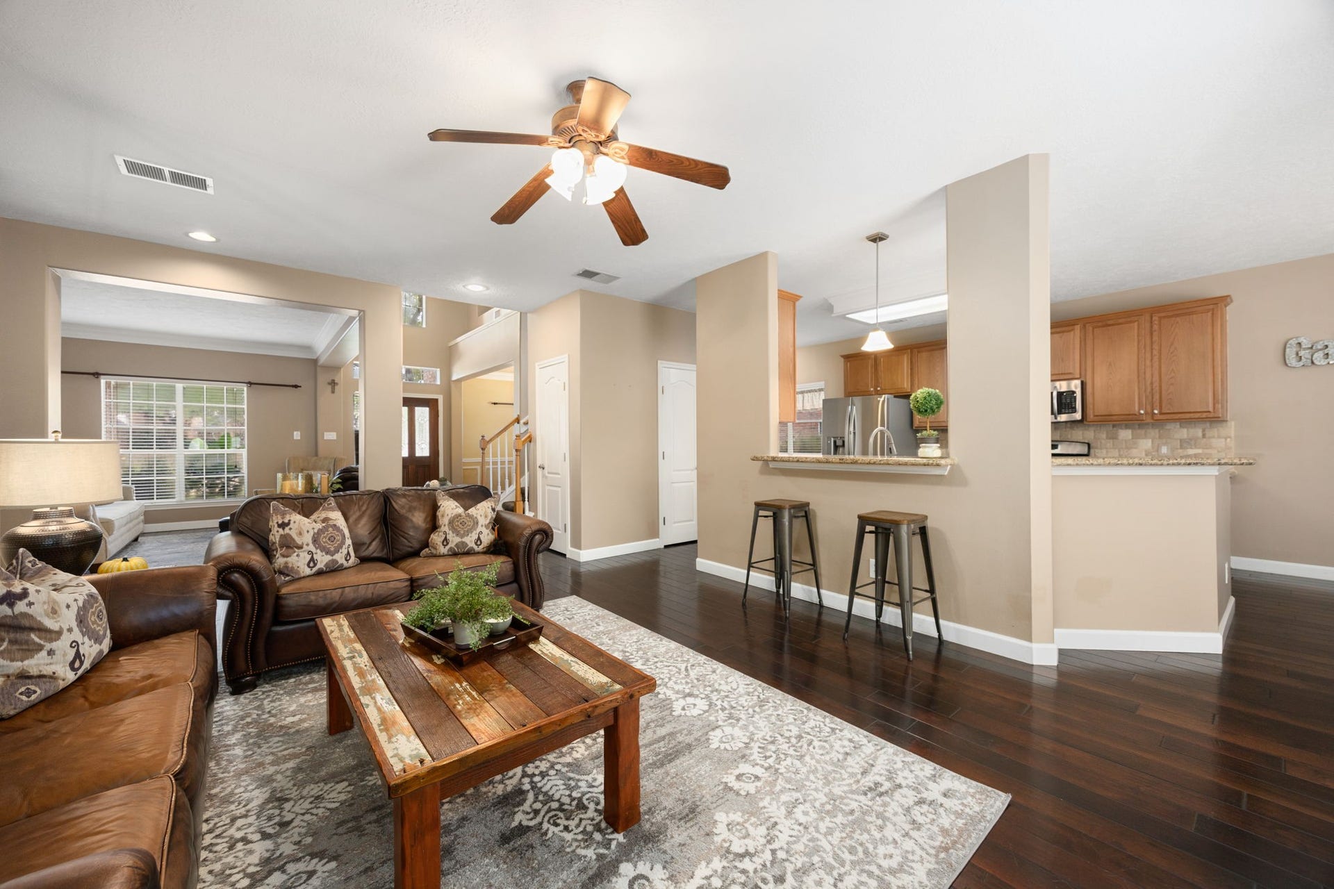1427 Queens Bay Drive, Katy, TX 77494 From this angle, you can see how seamlessly the family room connects to the kitchen, creating an open, easy flow that's ideal for everyday living and entertaining.