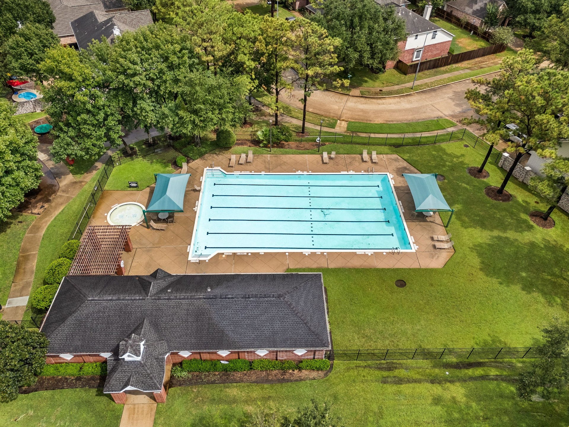 1427 Queens Bay Drive, Katy, TX 77494 The community pool offers lap lanes and a relaxing poolside area, perfect for staying active or cooling off.