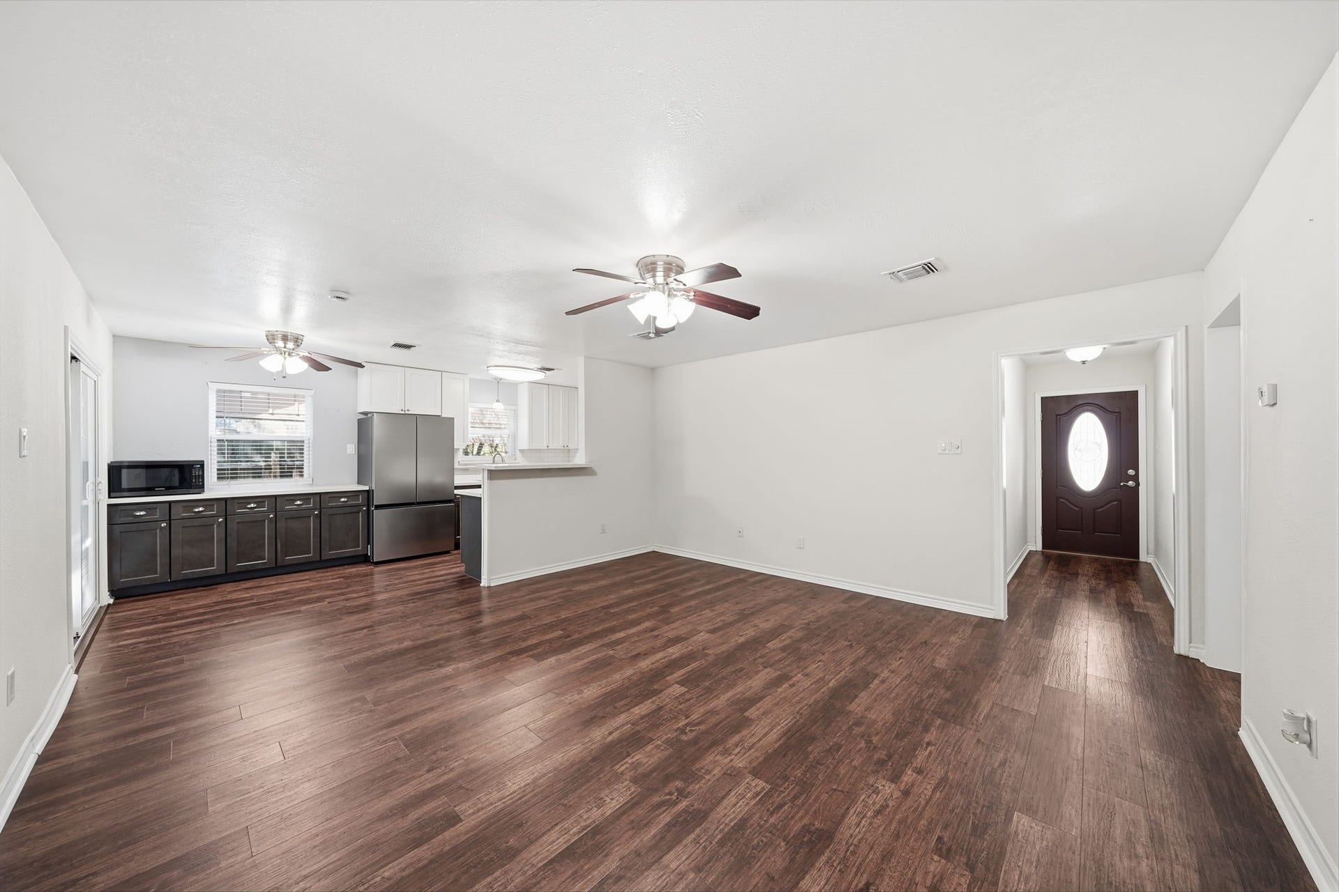 5208 Cunningham Drive, Pearland, TX 77581 Another View of Living Room open to Breakfast Area and Kitchen