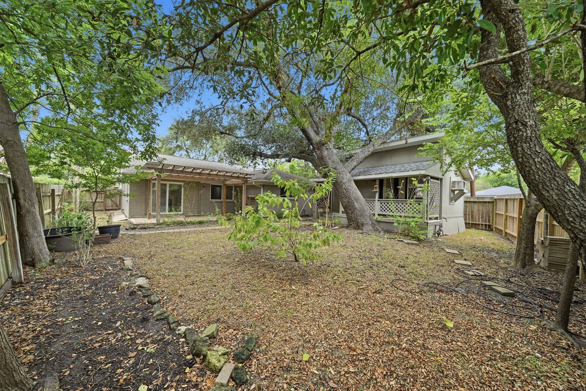 5208 Cunningham Drive, Pearland, TX 77581 Backyard with view of Guest Cottage on the right.