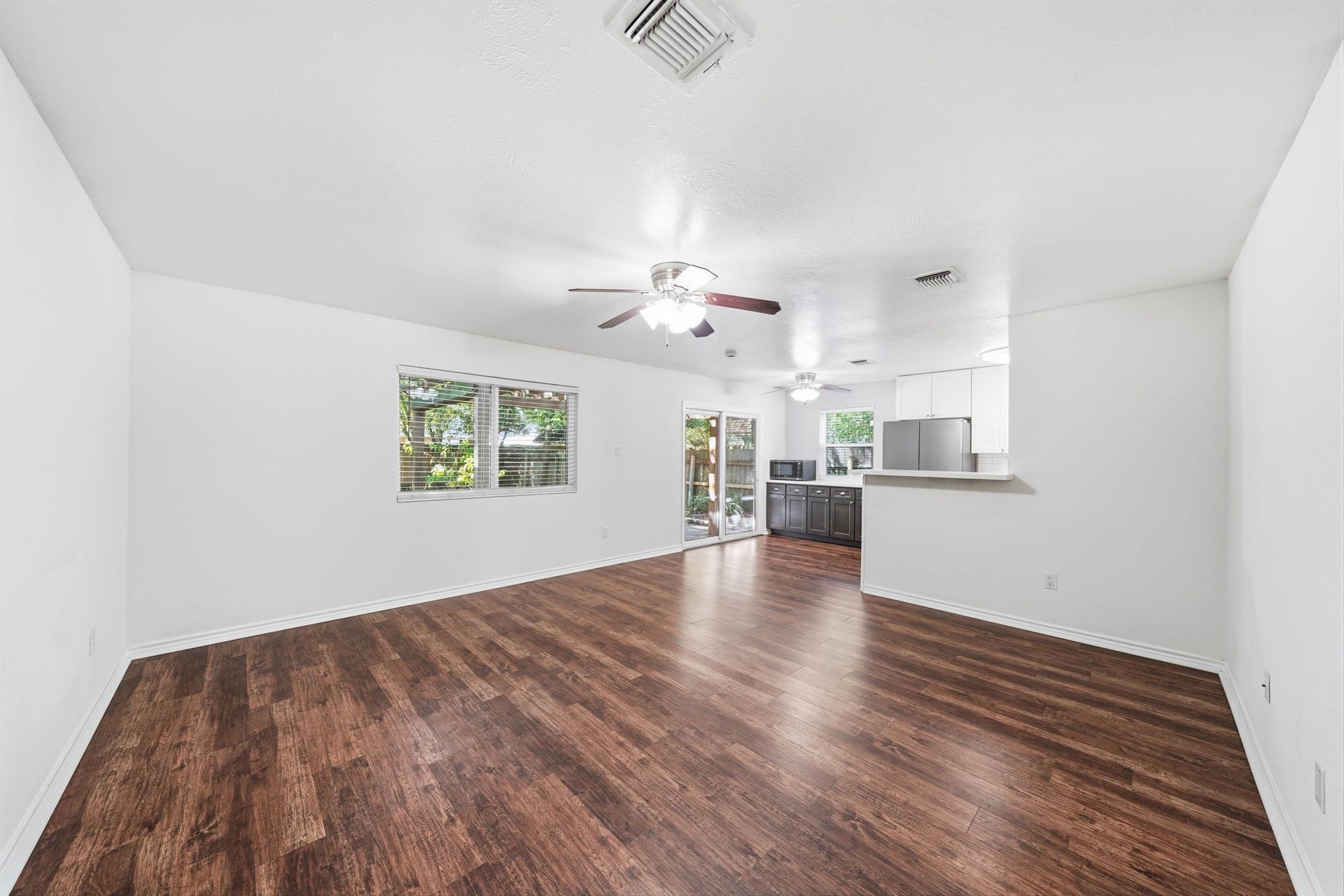 5208 Cunningham Drive, Pearland, TX 77581 Beautiful Vinyl Plank flooring with Living Room open to Breakfast Area