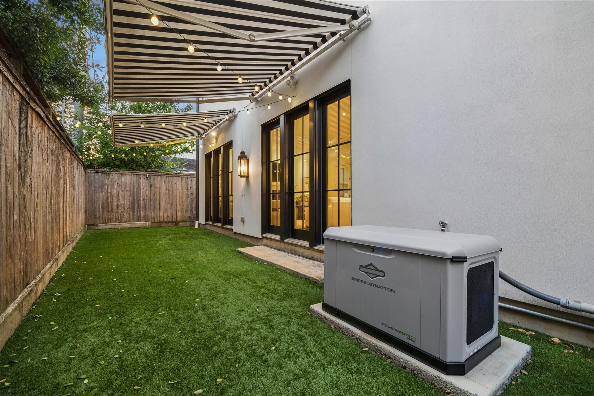 1647 Vassar Street, Houston, TX 77006 Whole-house generator located within the enclosed turfed backyard.
