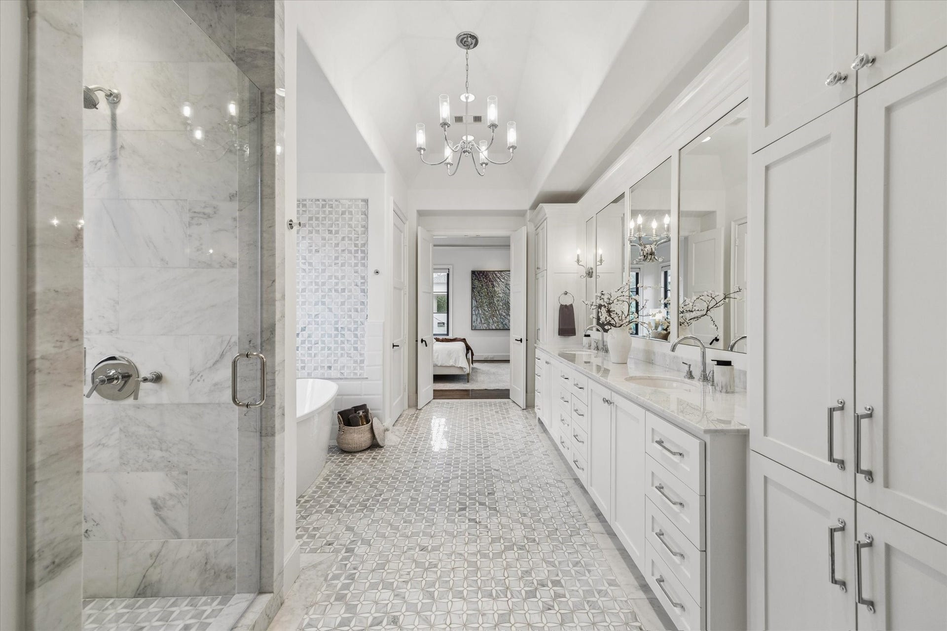 1647 Vassar Street, Houston, TX 77006 Primary bath with glass-enclosed shower and custom cabinetry.