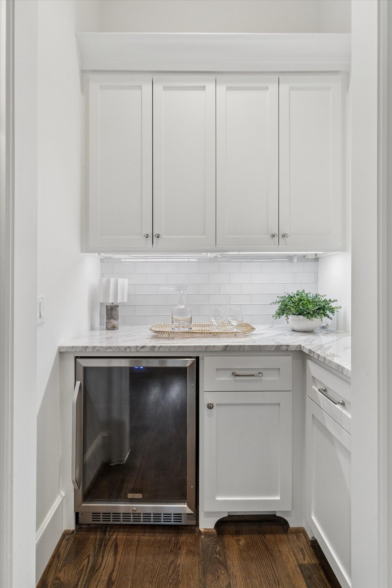 1647 Vassar Street, Houston, TX 77006 Luxurious dry bar area with wine refrigerator and custom cabinetry.