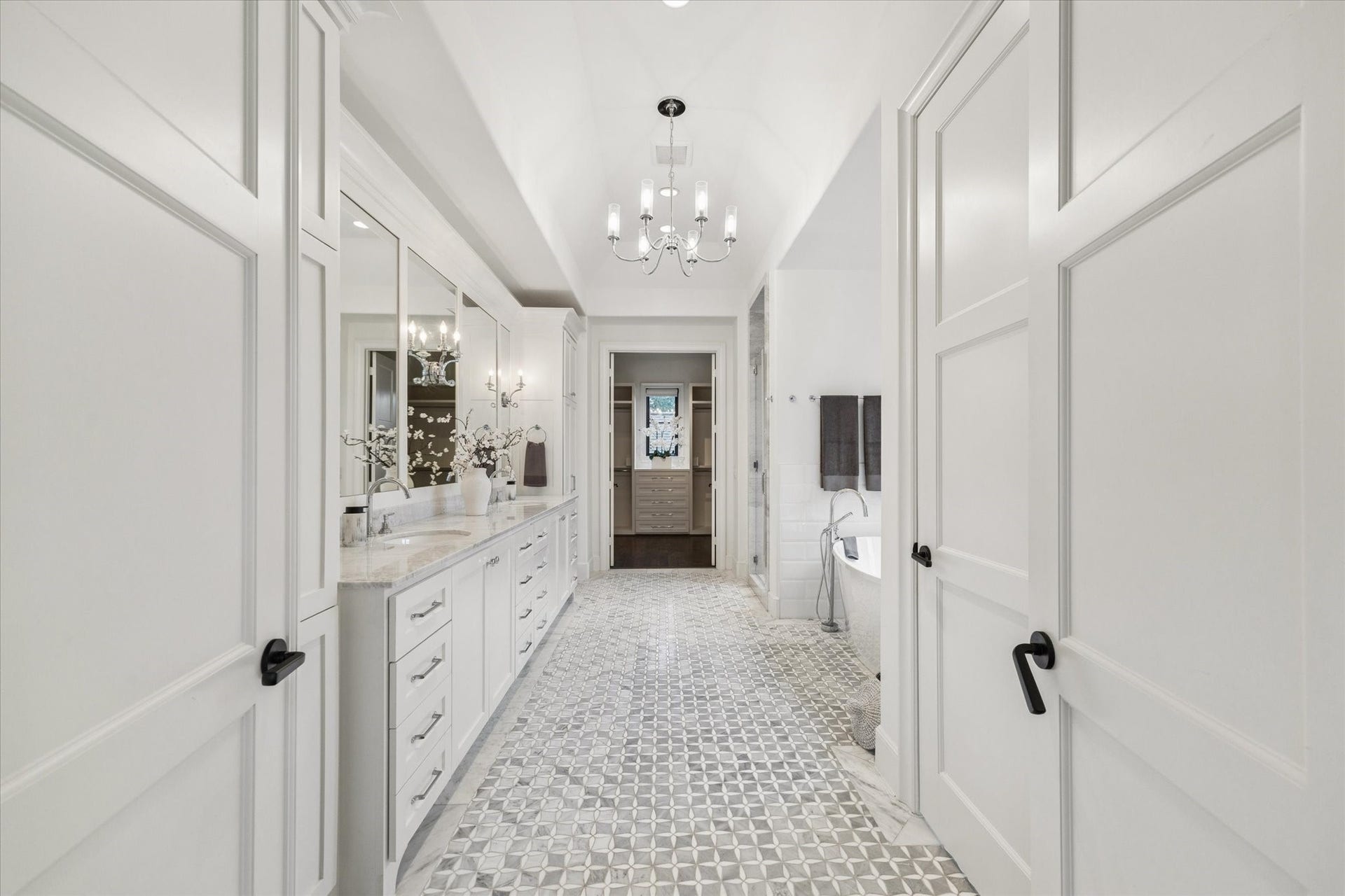 1647 Vassar Street, Houston, TX 77006 Spa-inspired primary bath with extensive built-in cabinetry.