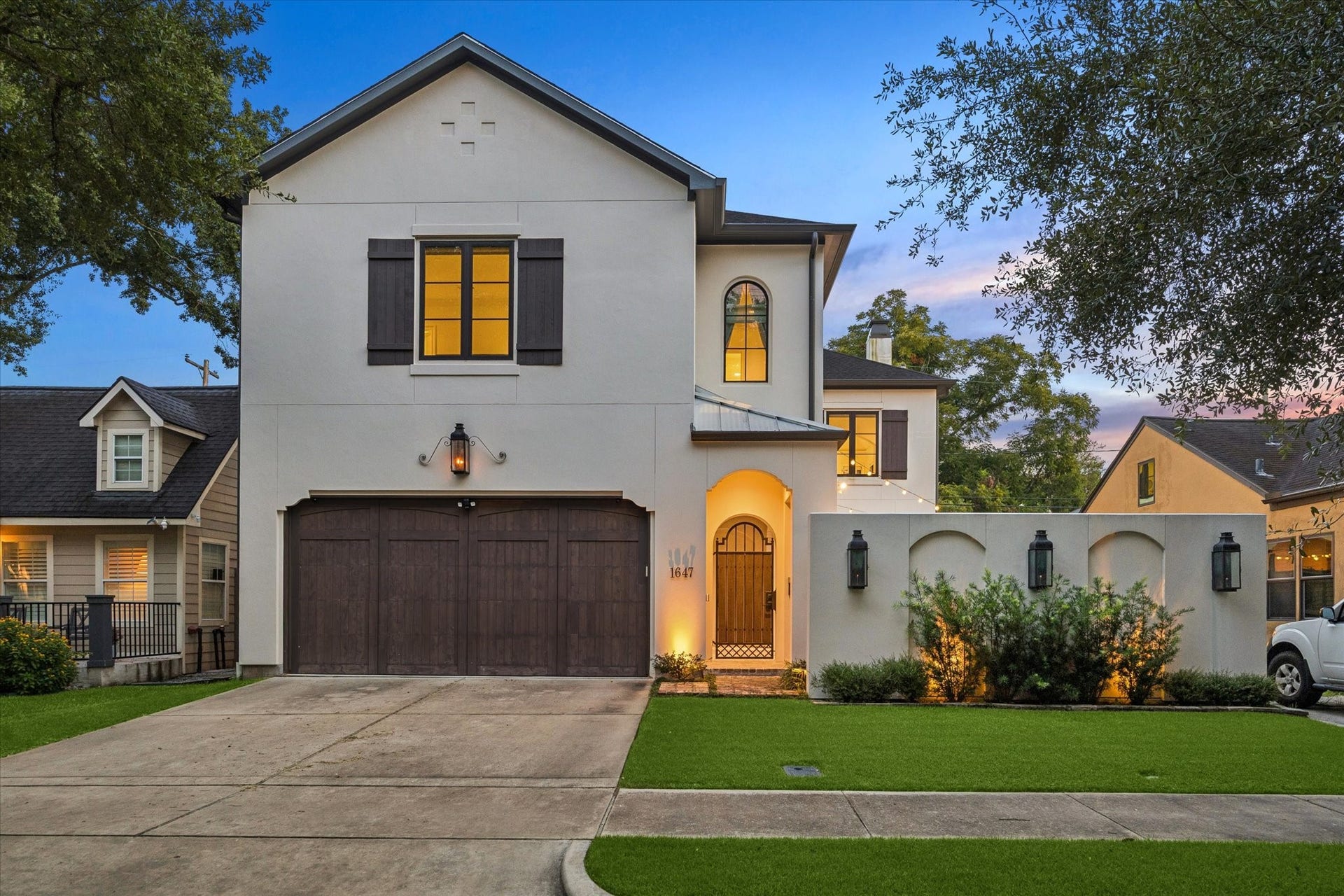 1647 Vassar Street, Houston, TX 77006 Welcoming front elevation with timeless architectural details and professionally designed landscaping.