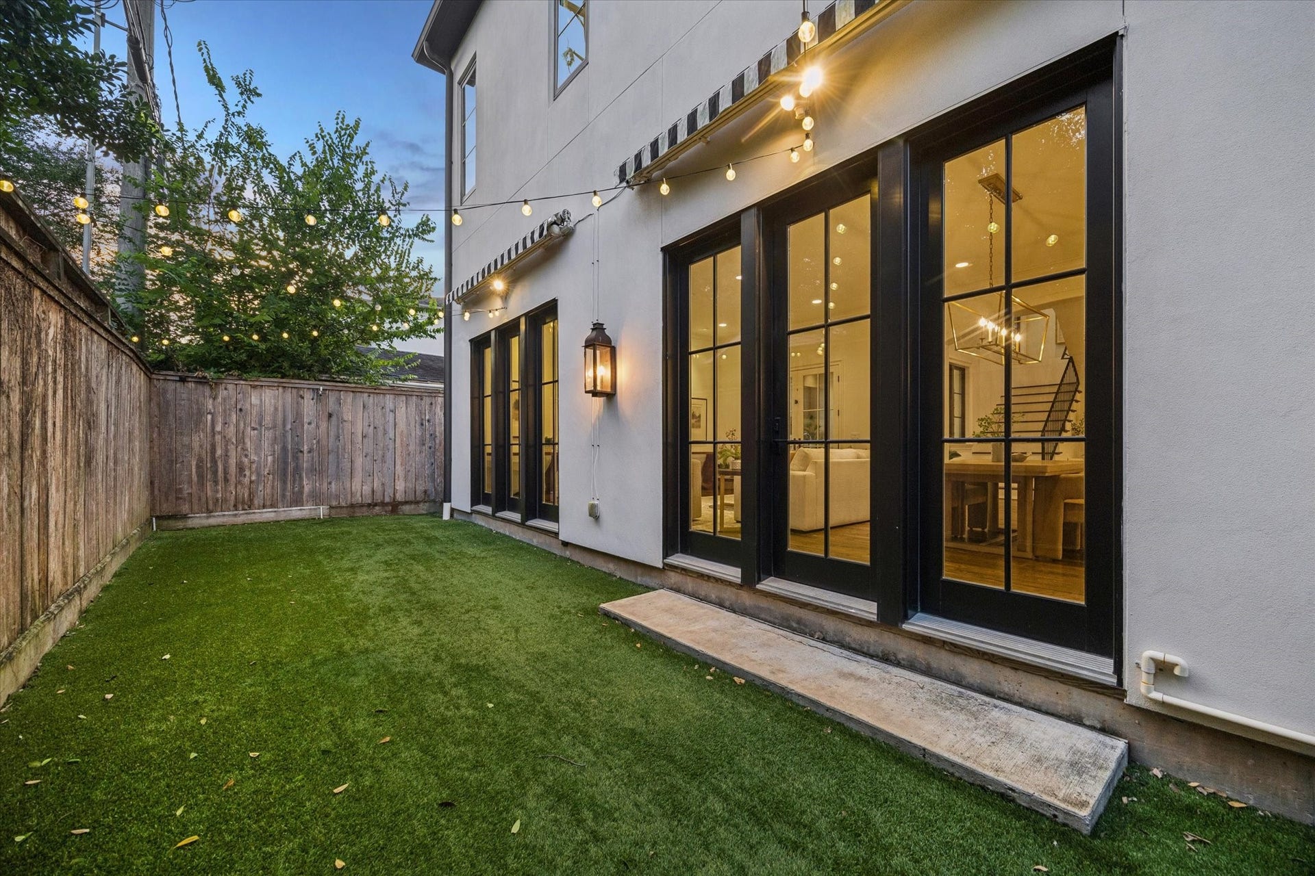 1647 Vassar Street, Houston, TX 77006 Private backyard with multiple access points to the home.