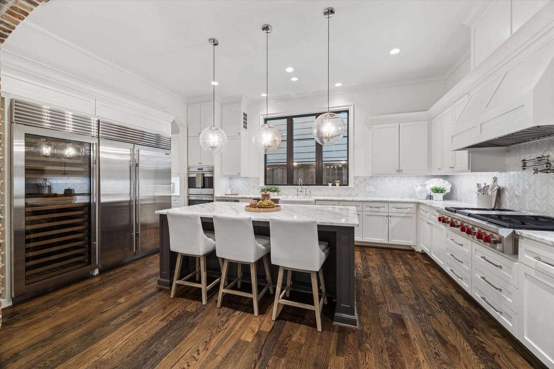 1647 Vassar Street, Houston, TX 77006 Spacious natural stone kitchen island ideal for dining and entertaining.