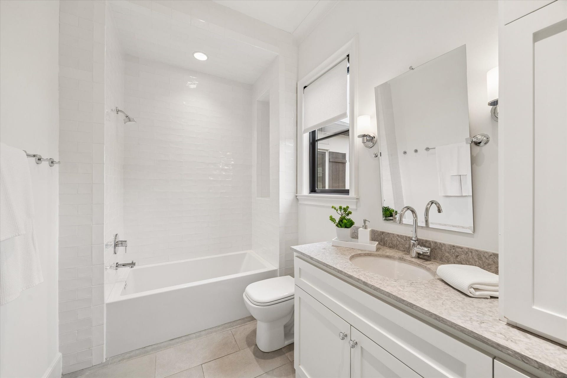 1647 Vassar Street, Houston, TX 77006 En-suite bathroom with generous vanity and storage.