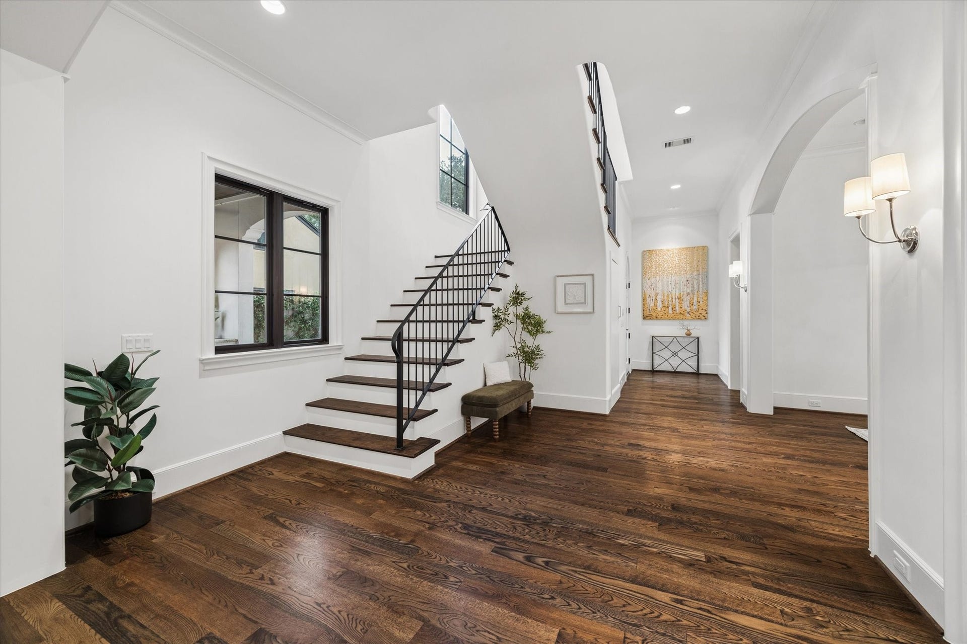 1647 Vassar Street, Houston, TX 77006 Bright entryway with solid white oak flooring and elegant staircase.