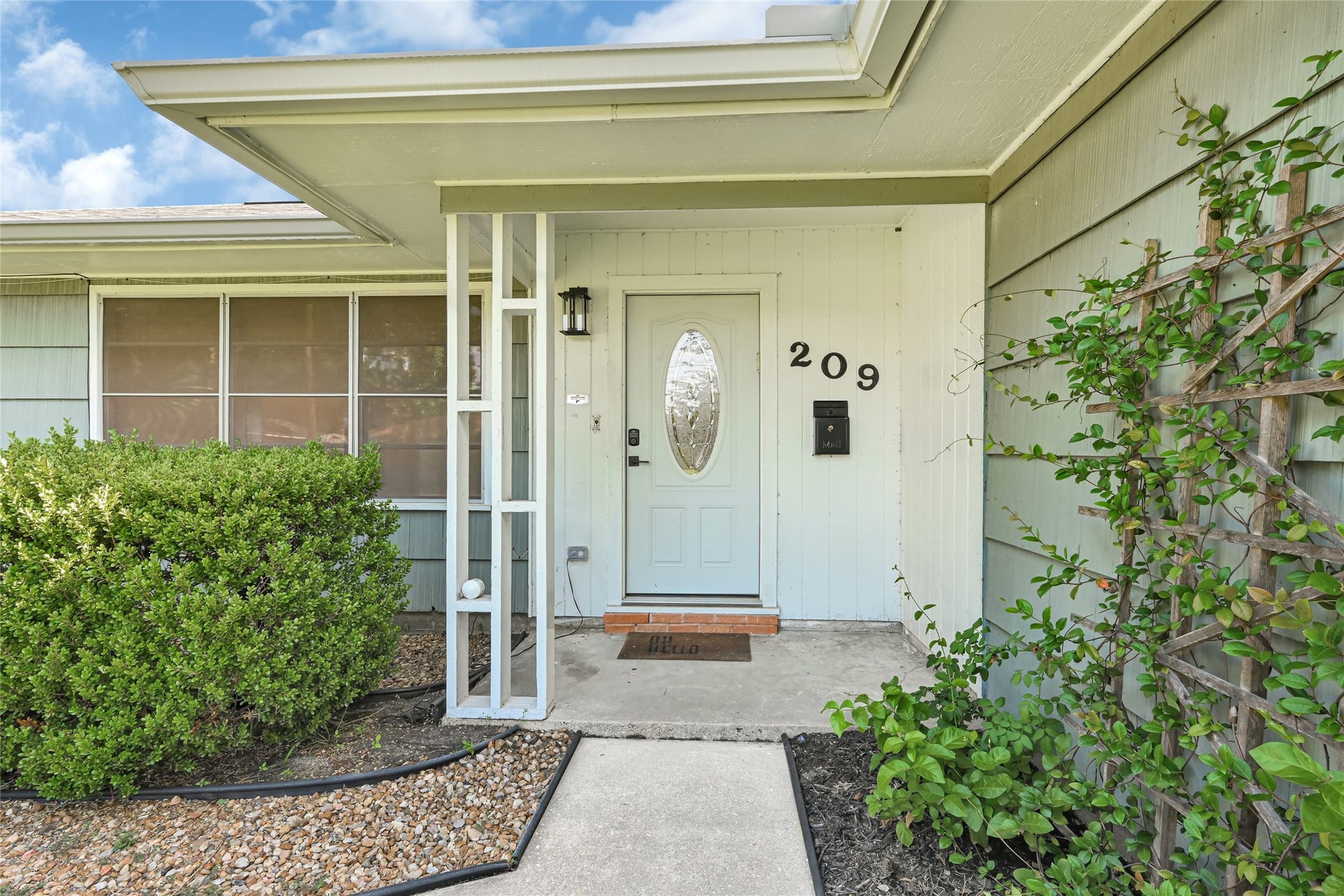 209 W 6th Street, Deer Park, TX 77536 Charming and inviting, 209 W 6th St welcomes you with lush greenery and delightful curb appeal.