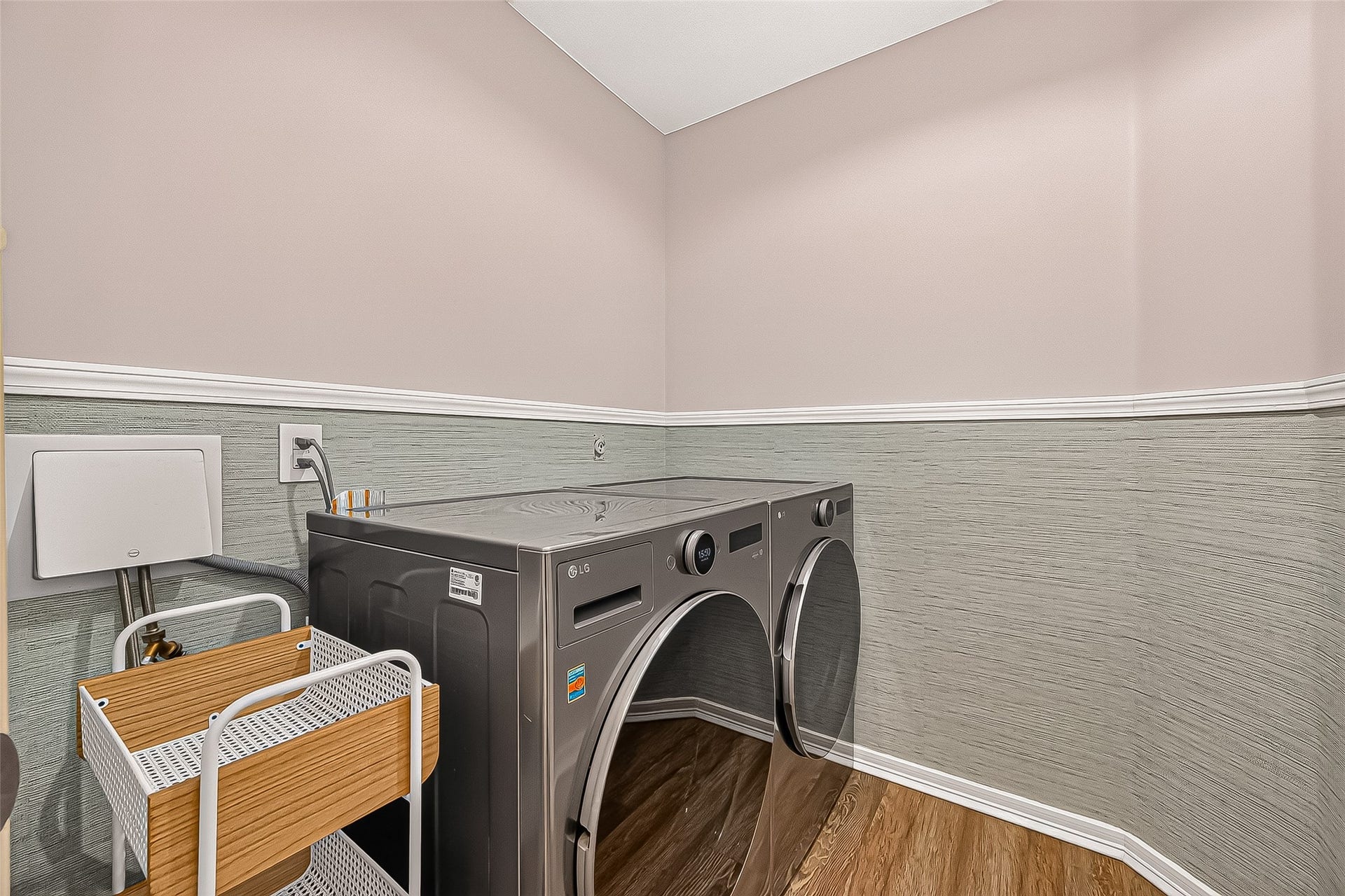 7406 Pleasant Ridge Drive, Houston, TX 77095 laundry room with nice color