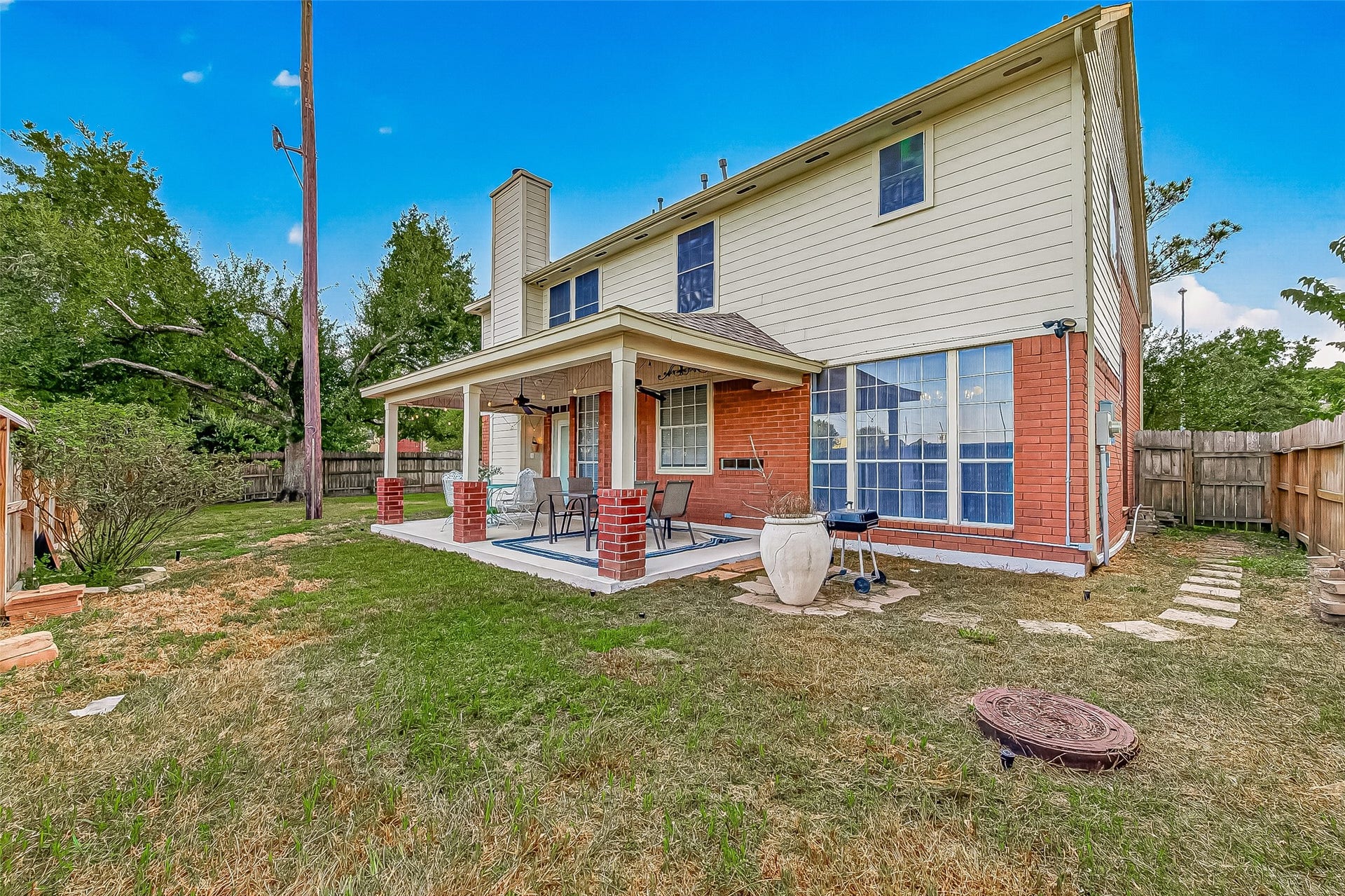 7406 Pleasant Ridge Drive, Houston, TX 77095 Large covered patio family gathering
