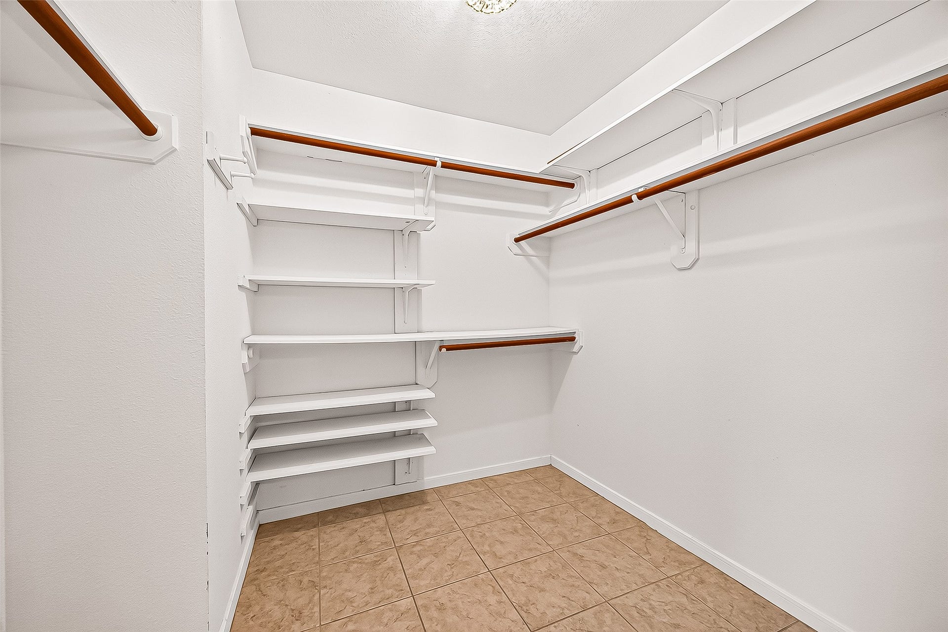 7406 Pleasant Ridge Drive, Houston, TX 77095 walk in big primary closet