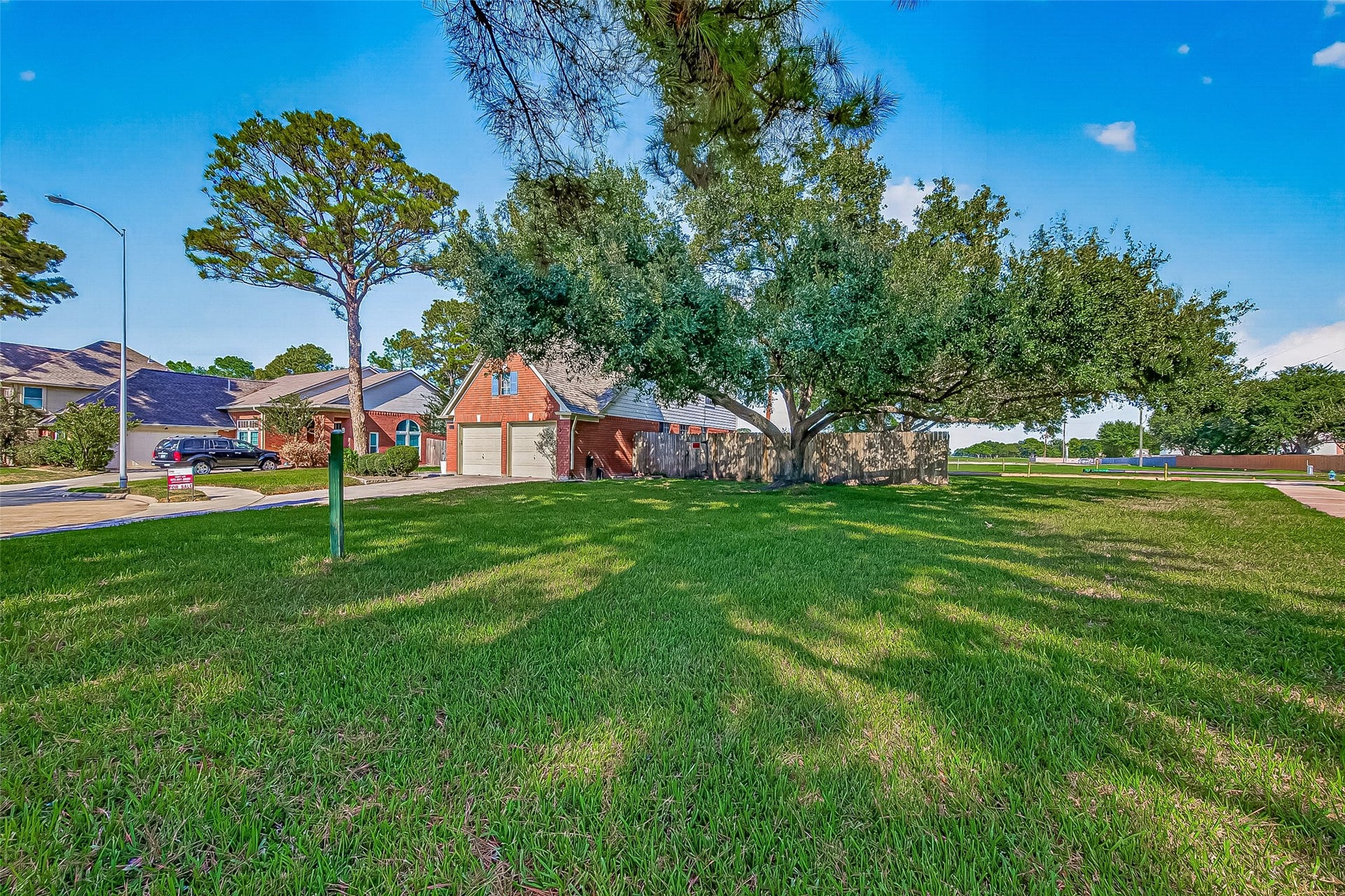 7406 Pleasant Ridge Drive, Houston, TX 77095 Stunning greenbelt view adjacent to the property, offering privacy and natural scenery