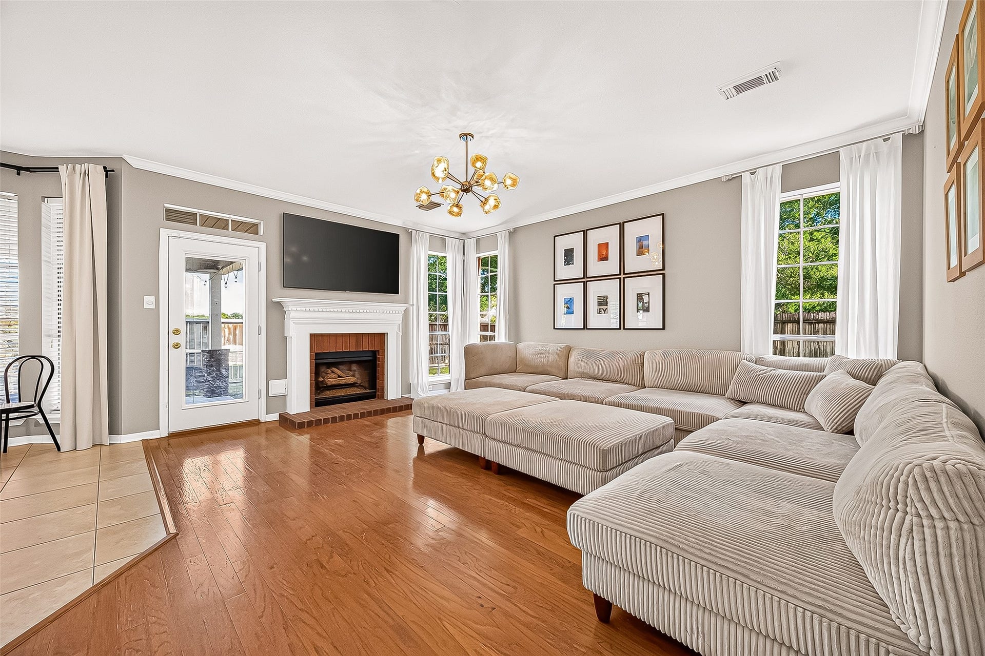 7406 Pleasant Ridge Drive, Houston, TX 77095 Spacious family room featuring bright and warm, and offer happy family time
