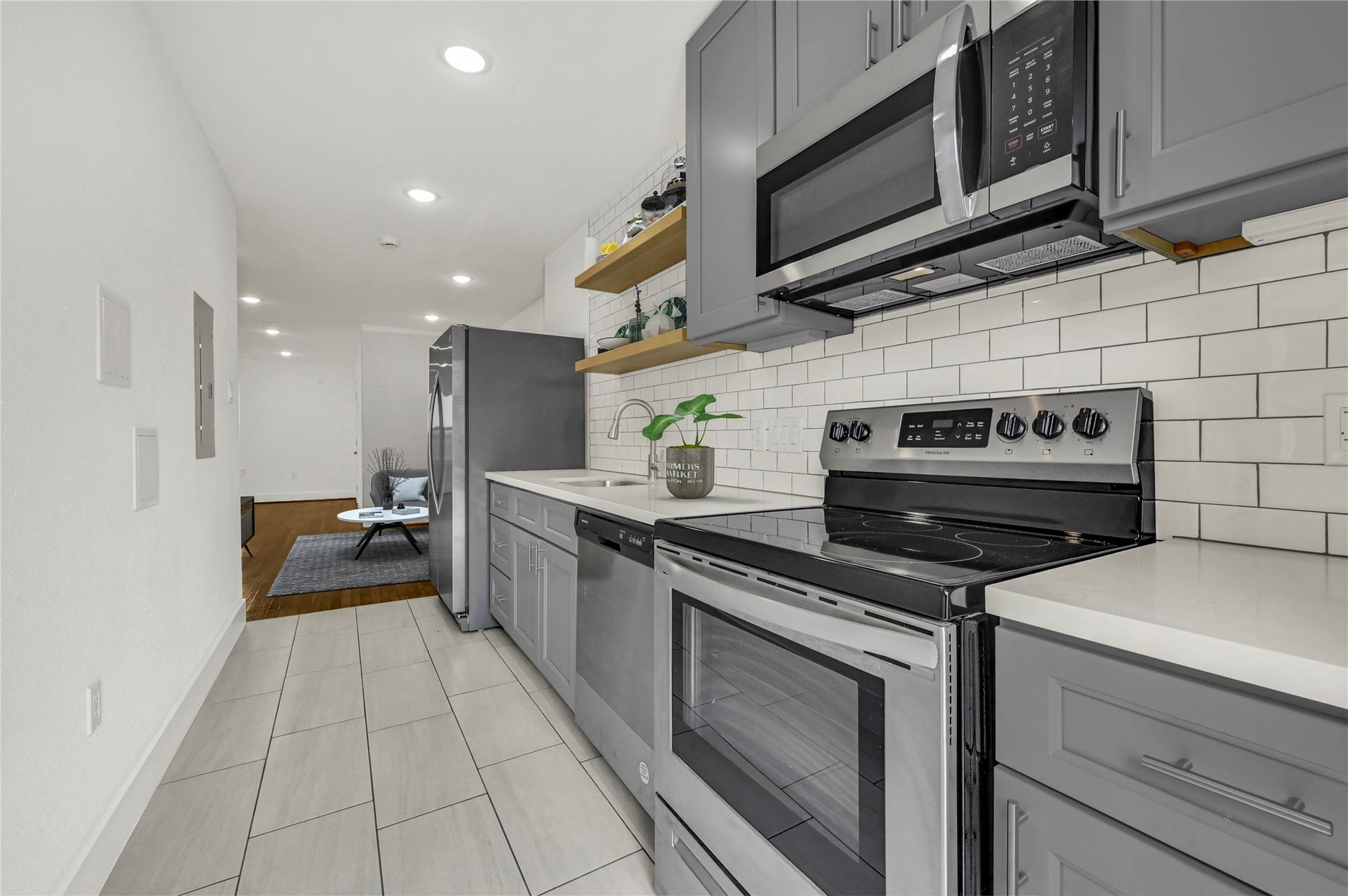 6620 Lawndale Street, #1, Houston, TX 77023 Representative photo of Unit 2 kitchen; actual Unit 1 layout and finishes may vary.