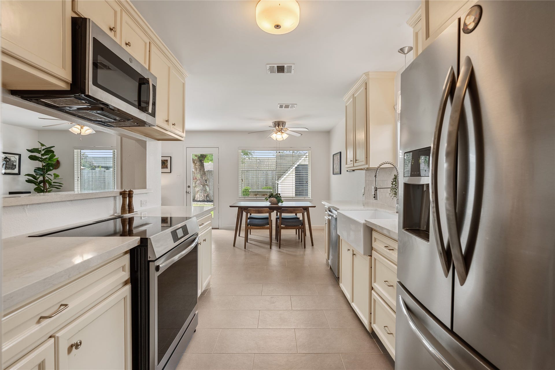 2302 Willowby Drive, Houston, TX 77008 Another view of the kitchen with new convection oven and breakfast bar cut out connecting family room to the kitchen