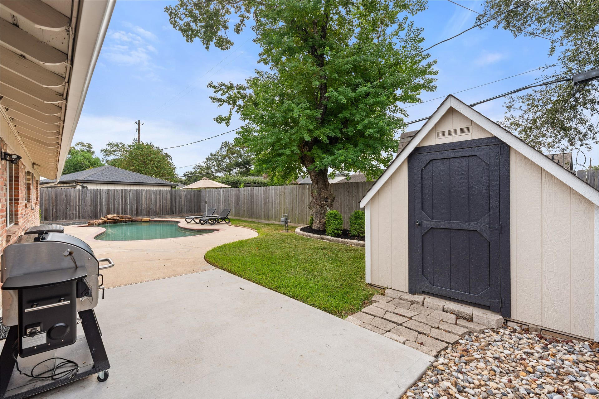 2302 Willowby Drive, Houston, TX 77008 Designed for more than just pool days, the backyard offers green space, a patio for grilling + entertaining, and a storage shed for all the extras.