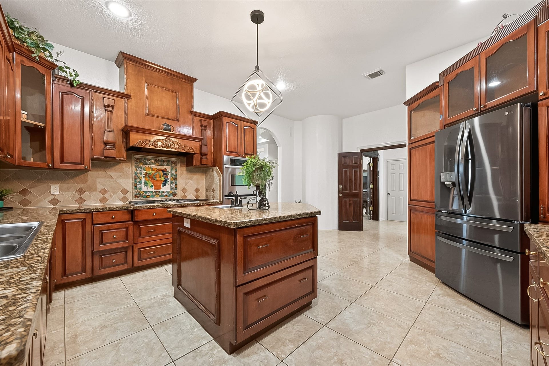 21832 Rayford Road, Humble, TX 77338 Kitchen Features Custom Wood Cabinets and Granite