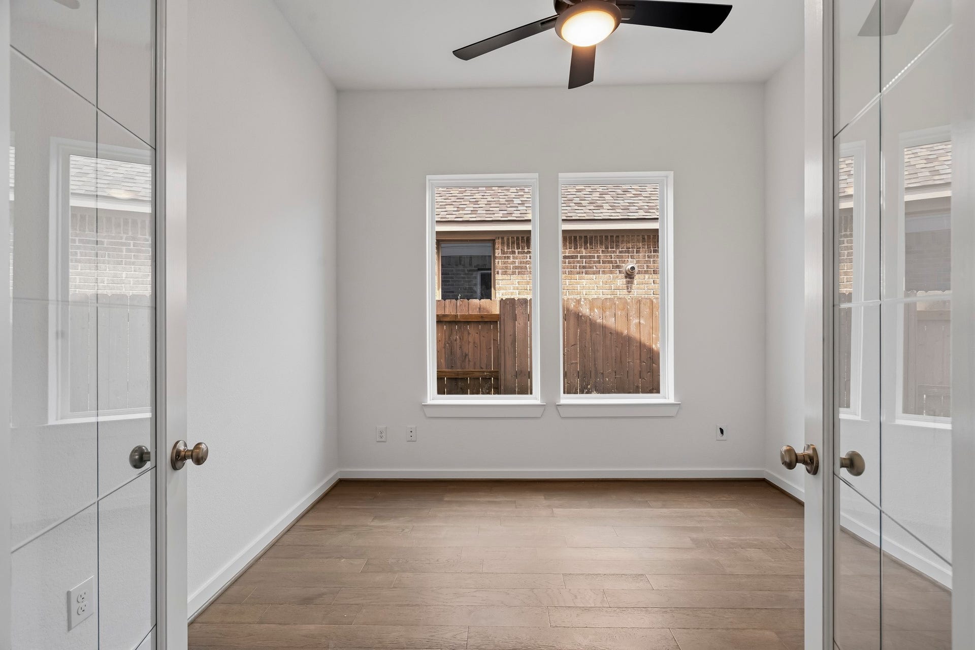 7439 Fraser Peak Drive, Katy, TX 77493 The study is closed off with french doors.