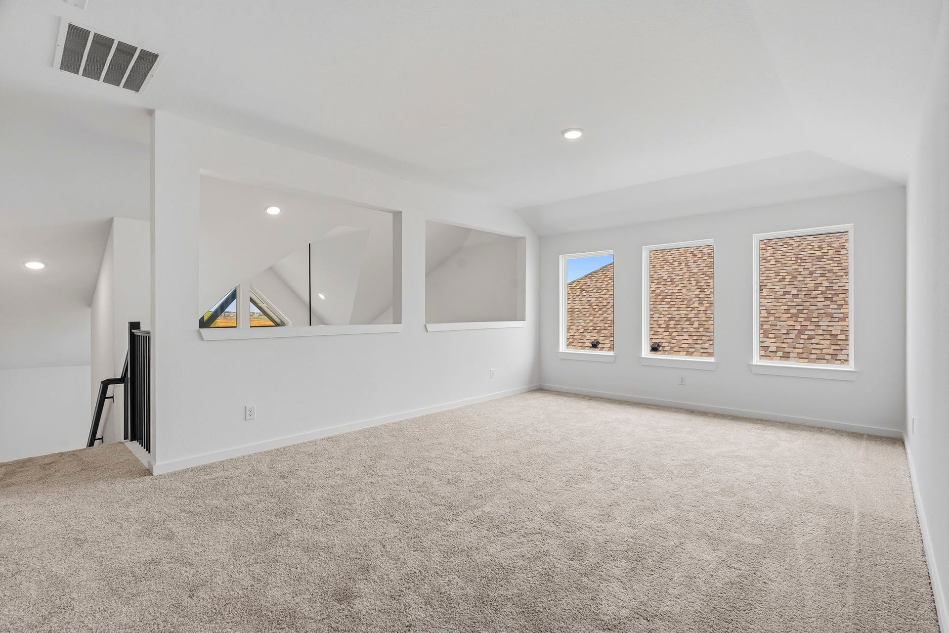 7439 Fraser Peak Drive, Katy, TX 77493 A spacious game room overlooks the first floor.
