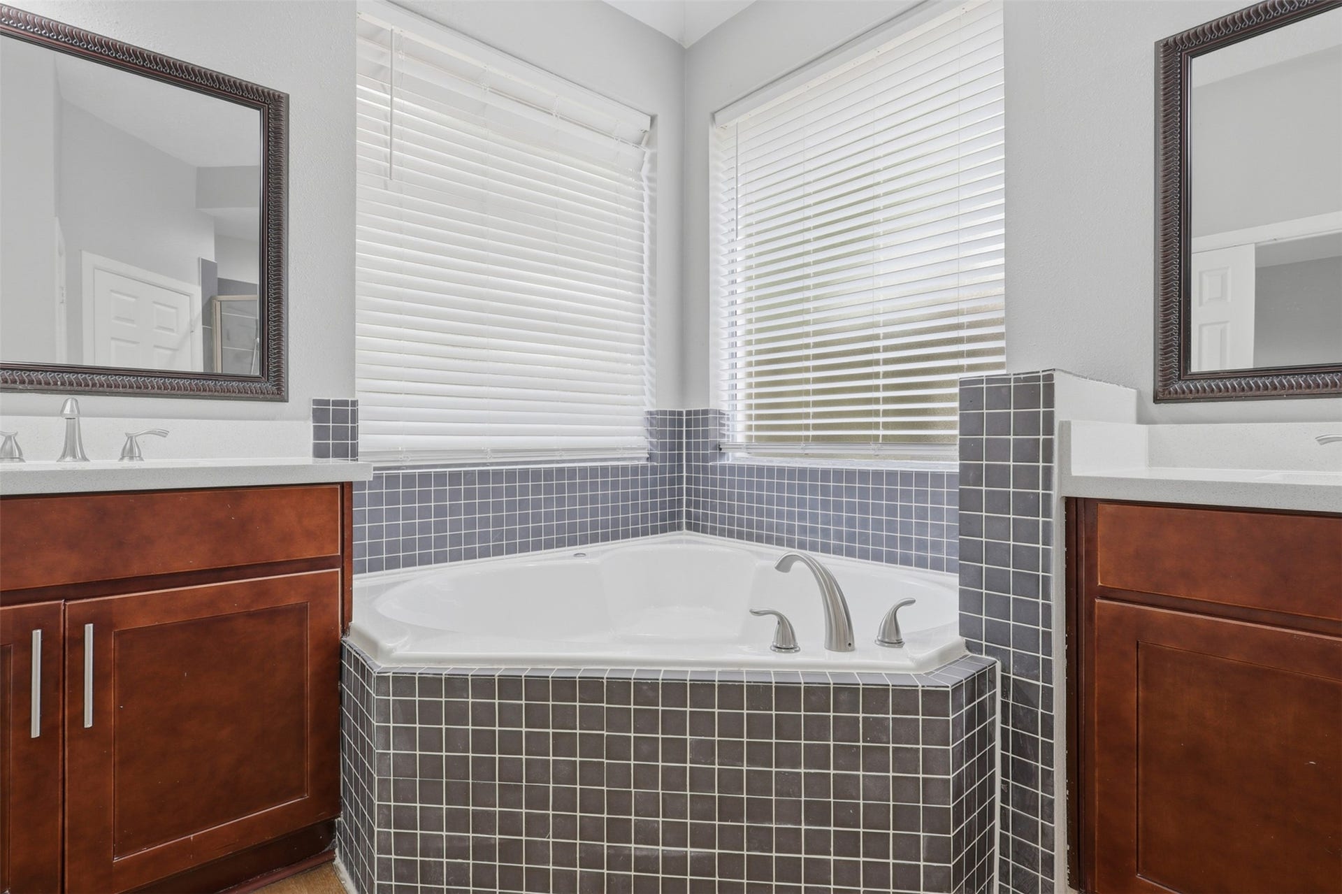 Just when you think you've seen it all, this luxurious primary suite bathroom continues to impress! Every detail has been thoughtfully upgraded, from the beautiful finishes to the exceptional craftsmanship. The list of improvements just keeps going, making this spa-inspired retreat as functional as it is stunning.