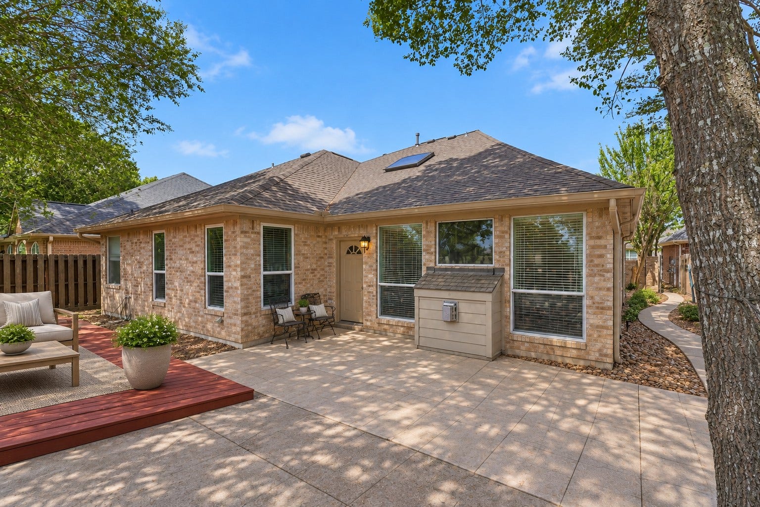 This timeless one-story ranch home features an all-brick exterior for lasting beauty and low-maintenance living. A full gutter system and an easy-care backyard provide added convenience, giving you more time to relax, entertain, and enjoy your outdoor living space.