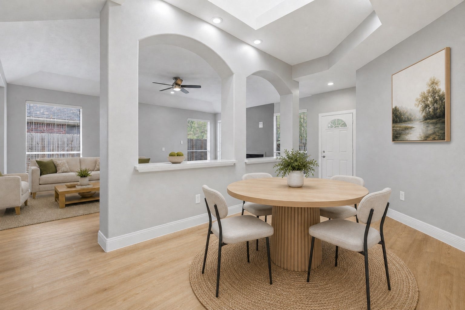 Notice the custom architectural details that make this stunning one-story ranch home truly special! The casual dining area features dramatic coffered ceilings, new recessed lighting, and an open design that enhances the home's spacious feel. Simply stunning and perfect for everyday meals or entertaining. Photo is Virtually Staged and the home is vacant, ready for you to create lasting memories.