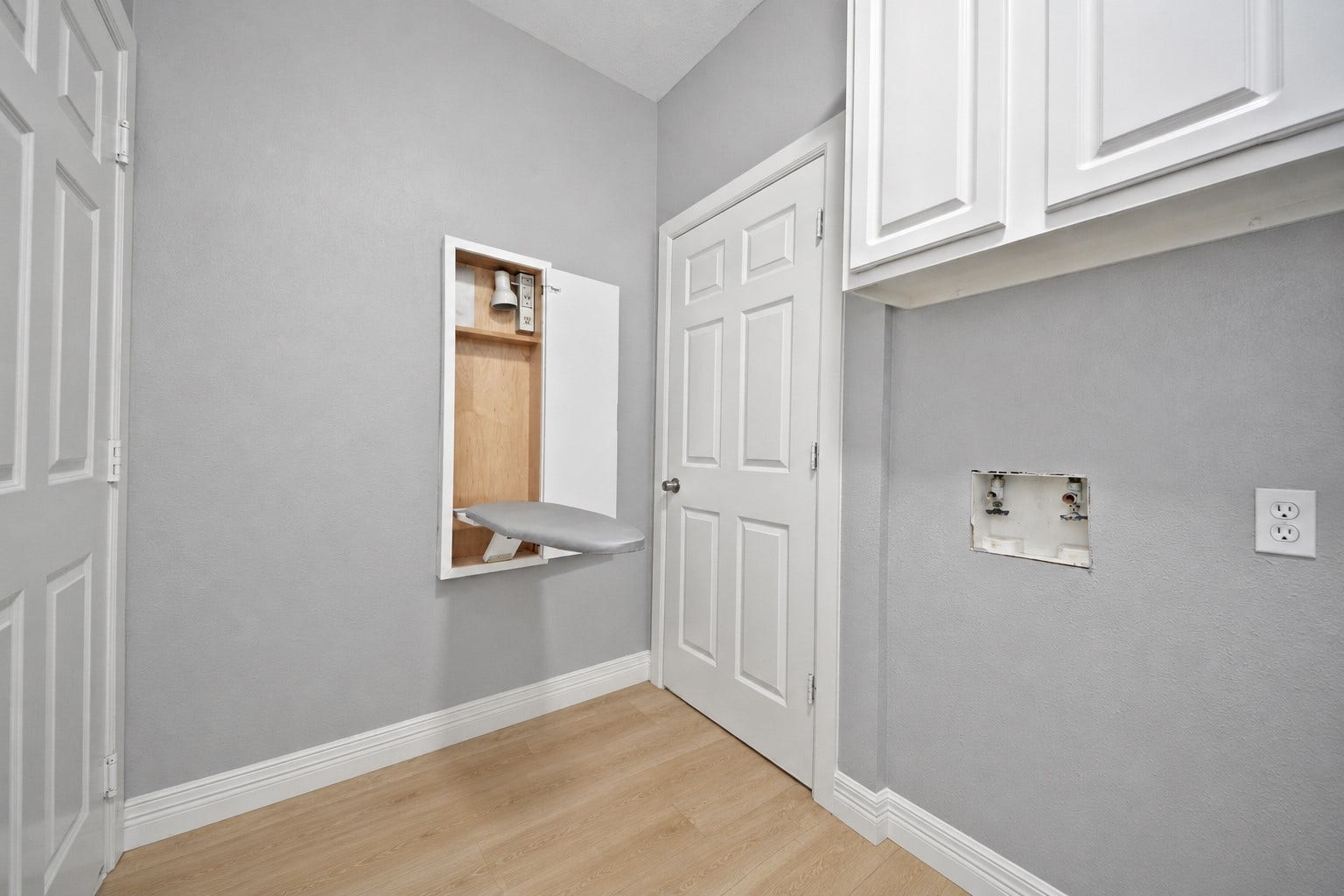 Here's a feature you'll lovea hidden fold-up ironing board! Conveniently tucked away yet always within easy reach, it's a thoughtful upgrade that saves space while making everyday chores a breeze. It's one of those features you'll wonder how you ever lived without!