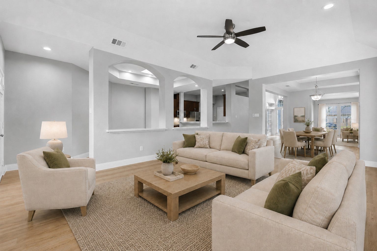 This spacious family room truly has it all! Designed with an open-concept layout, it flows effortlessly into the surrounding living spaces, creating the perfect setting for everyday living and entertaining. Completely remodeled with beautiful, modern finishes throughout, this exceptional home is move-in ready and waiting for you. Make that call today to schedule your private showing! Photo is Virtually Staged.