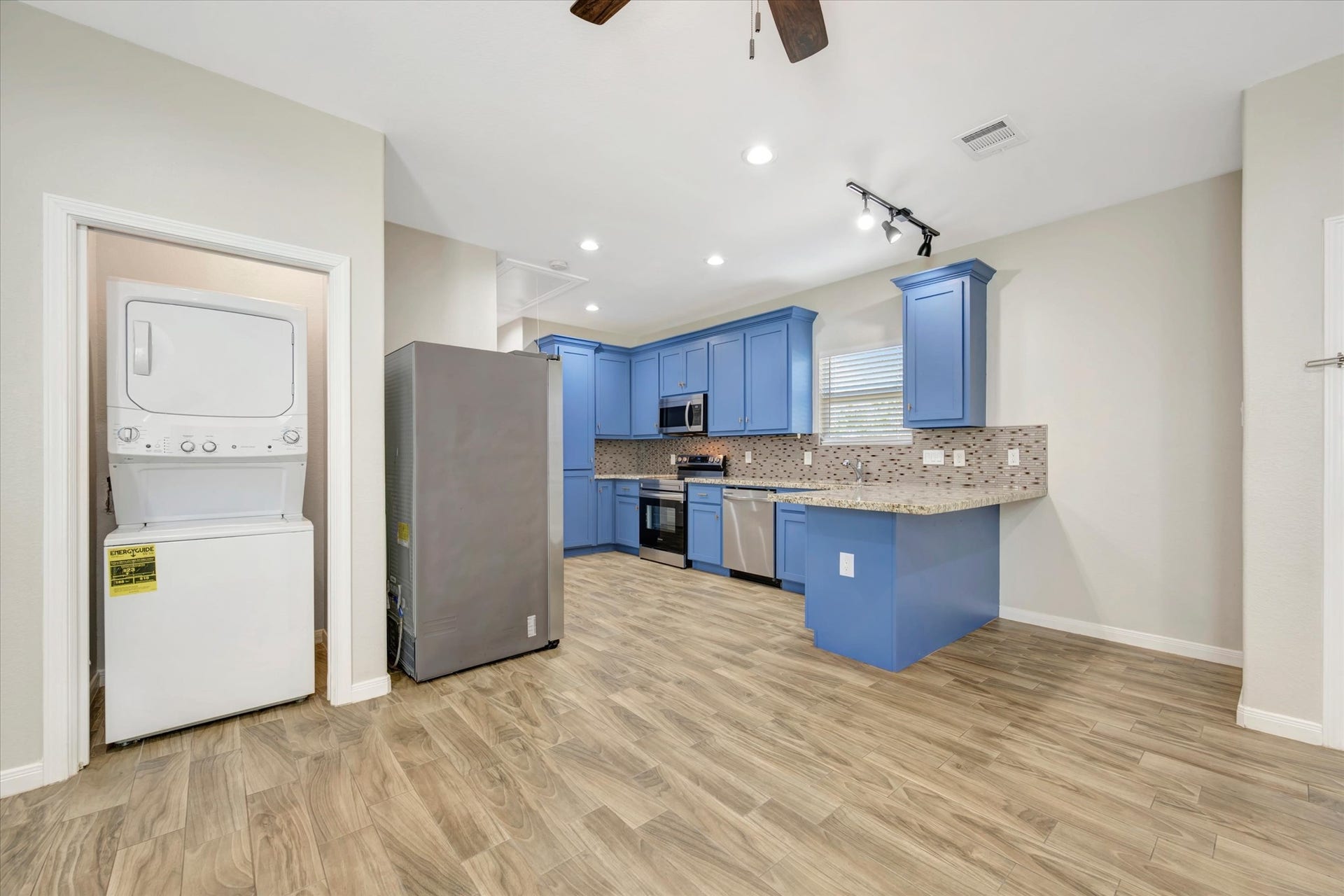 904 W Sealy, #B, Alvin, TX 77511 Stackable Washer/Dryer has a pocket door to help with the noise when running