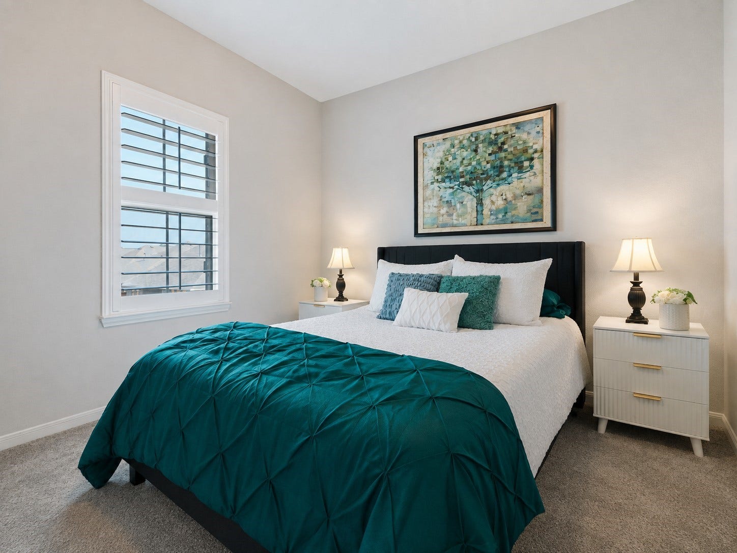 Cozy upstairs secondary bedroom is a serene retreat and also contains a walk-iin closet.