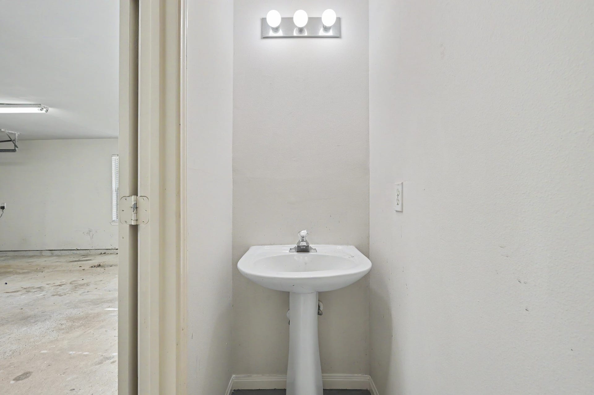 29823 Spring Acres Drive, Spring, TX 77386 1/2 bath in garage is perfect for cleaning up after working outside