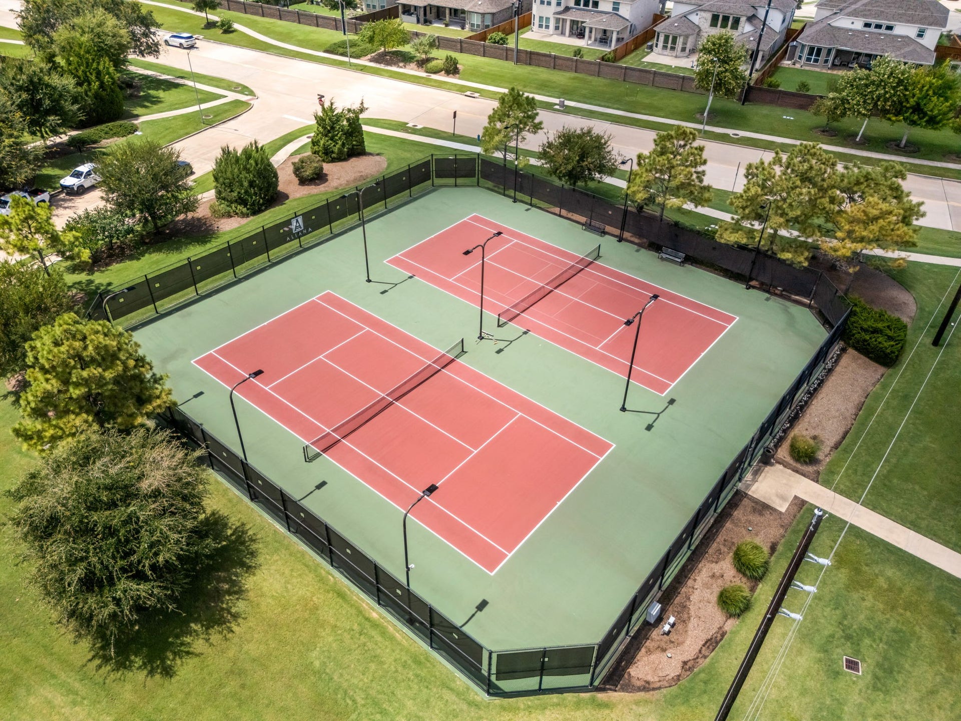 10606 Comeaux Lane, Richmond, TX 77407 Alianas lighted tennis courts offer residents another way to enjoy the communitys extensive recreational amenities, with multiple courts available for play just minutes from home.