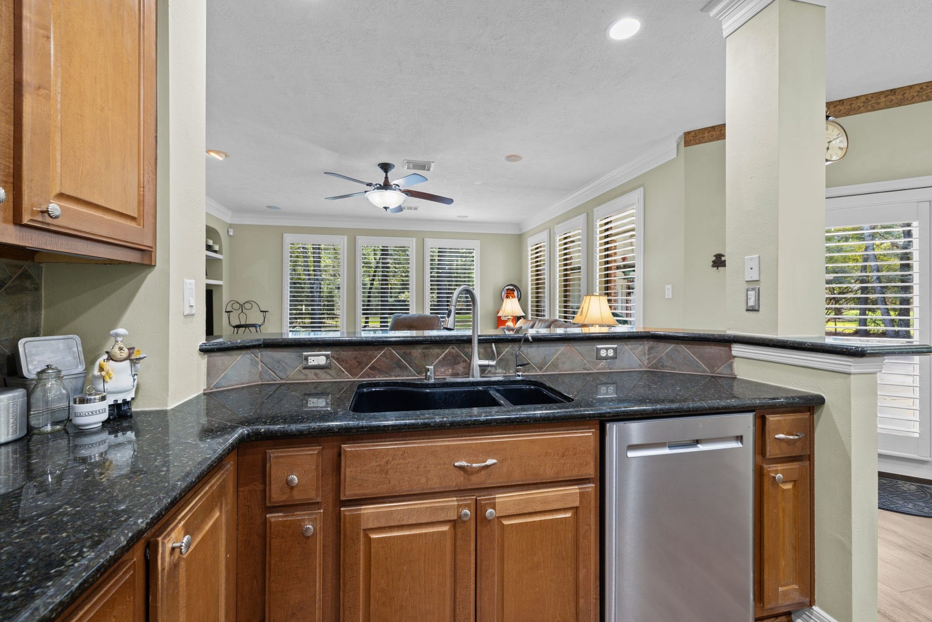 View from kitchen overlooking bar space
