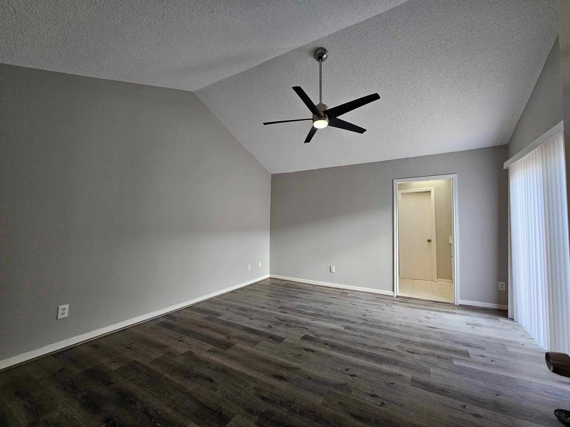 High ceiling and bright Primary bedroom
