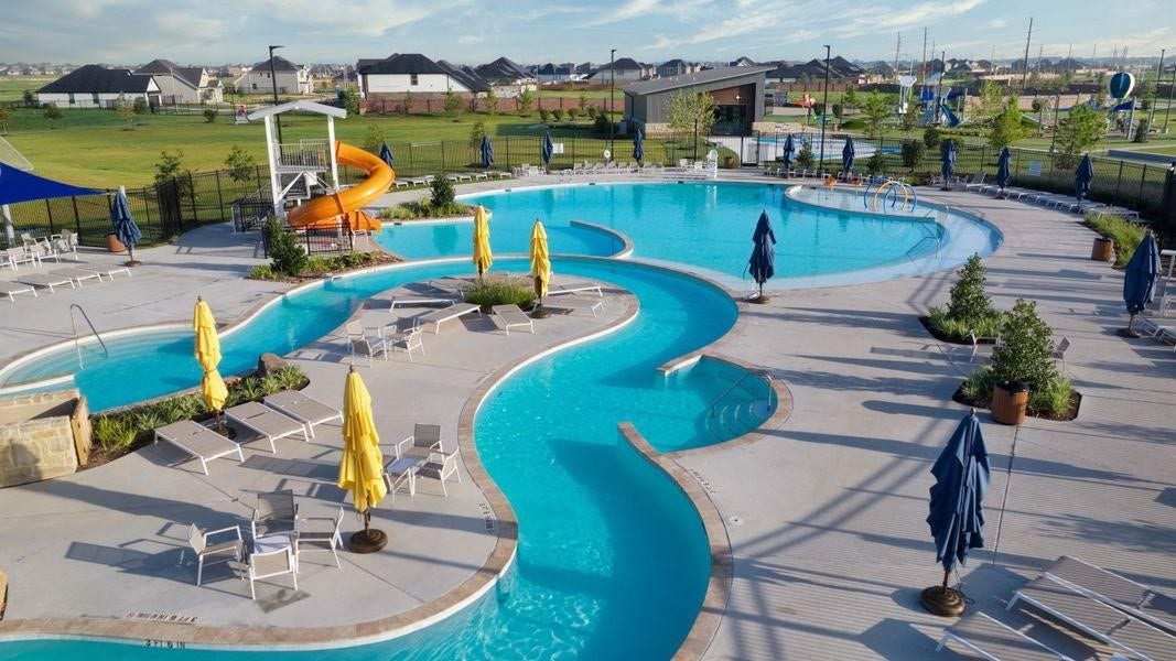 5029 Almond Terrace Drive, Katy, TX 77493 Other amenities include resort-style swimming pool with waterslide, lazy river, splash pad, fitness center and yoga facilities, clubhouse, dog park, and sports fields.
