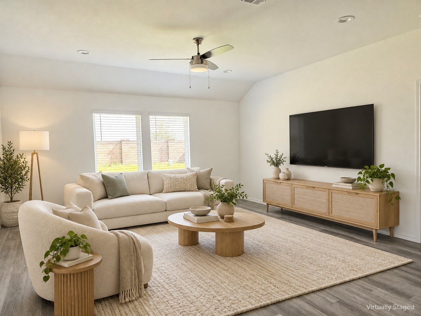 5029 Almond Terrace Drive, Katy, TX 77493 Expansive family room with ceiling fan and lots of natural light. This picture is virtually staged.