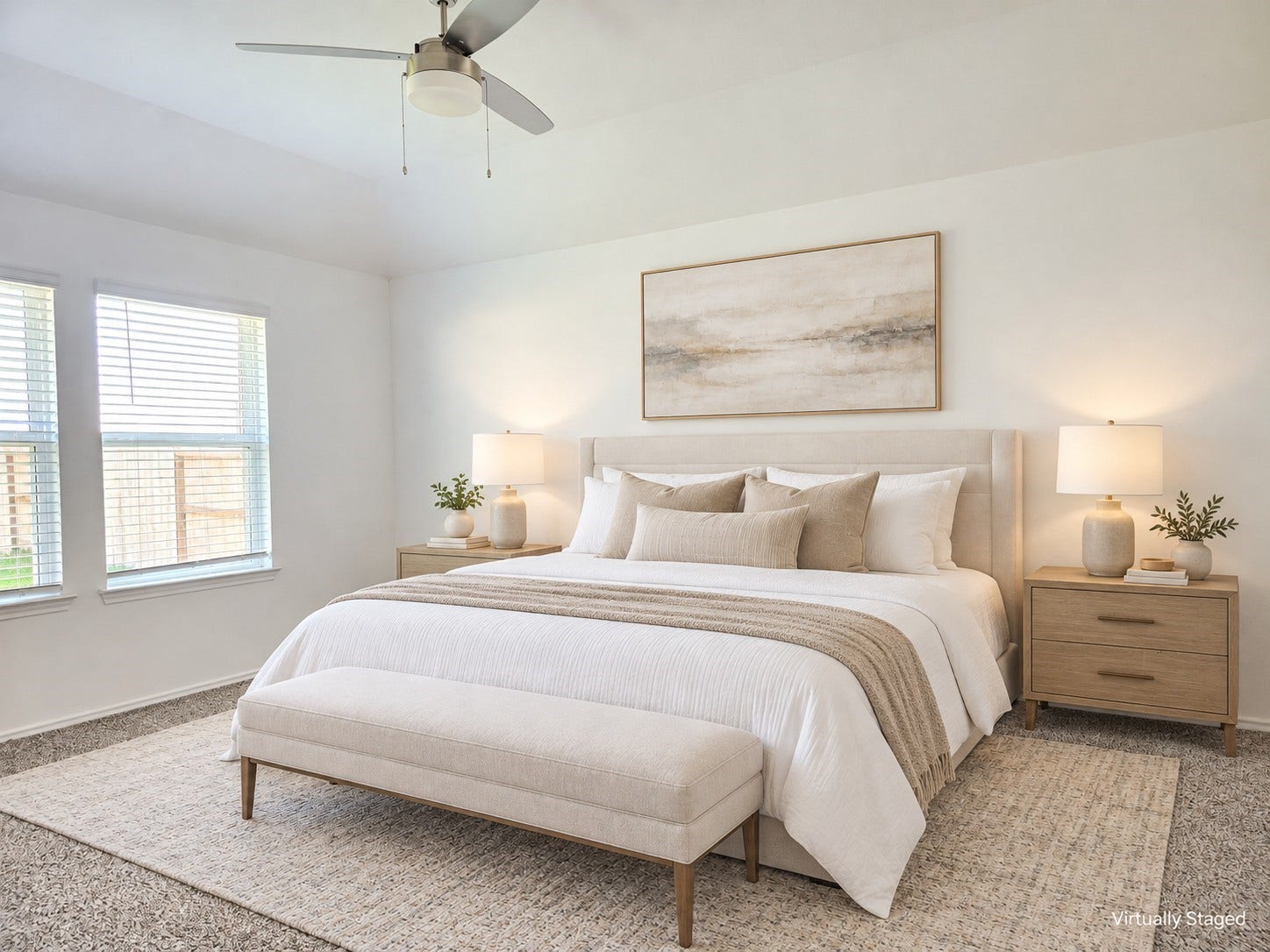 5029 Almond Terrace Drive, Katy, TX 77493 Expansive primary bedroom with ceiling fan. This picture is virtually staged.