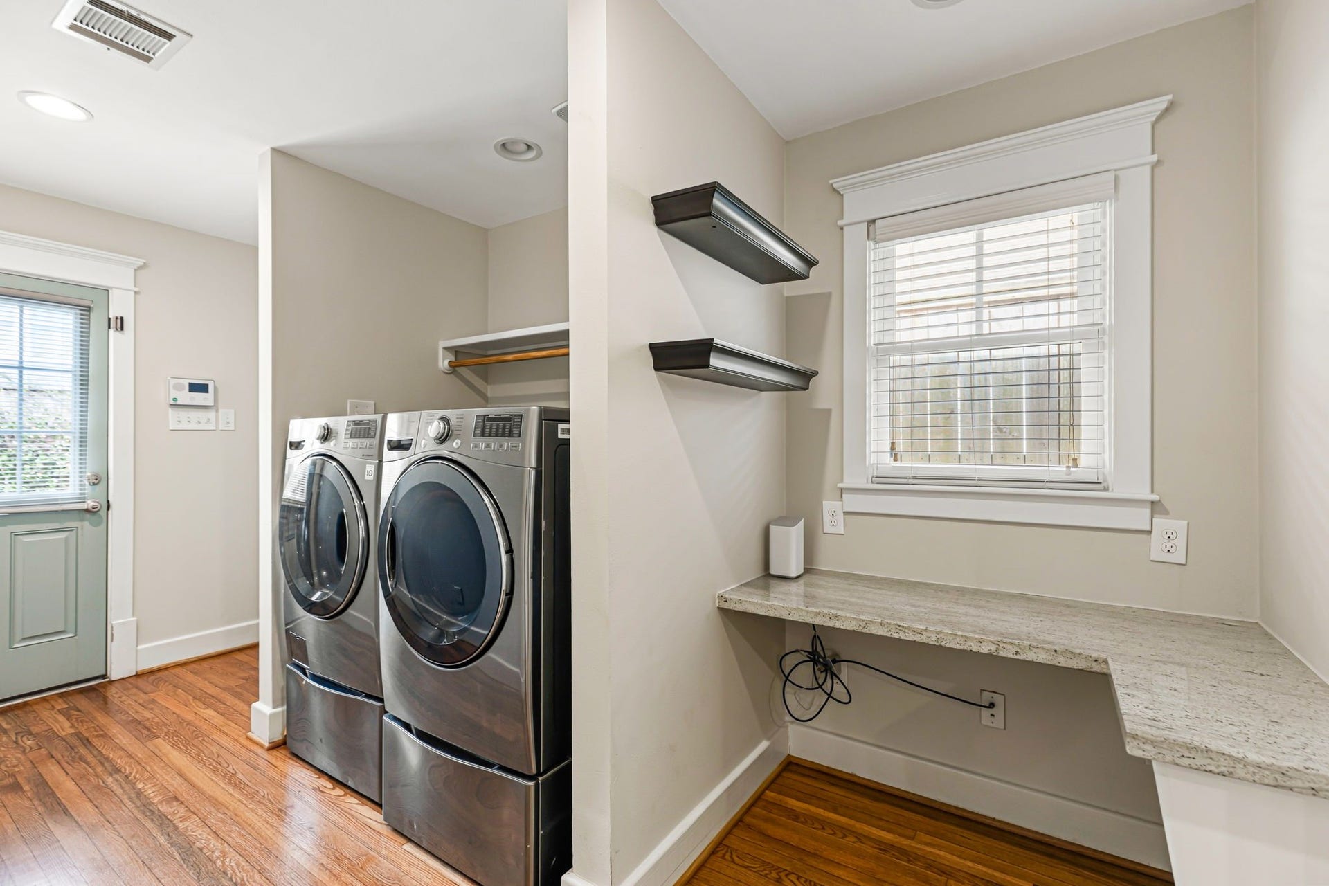 1329 Lawrence Street, Houston, TX 77008 Laundry area with extra storage.
