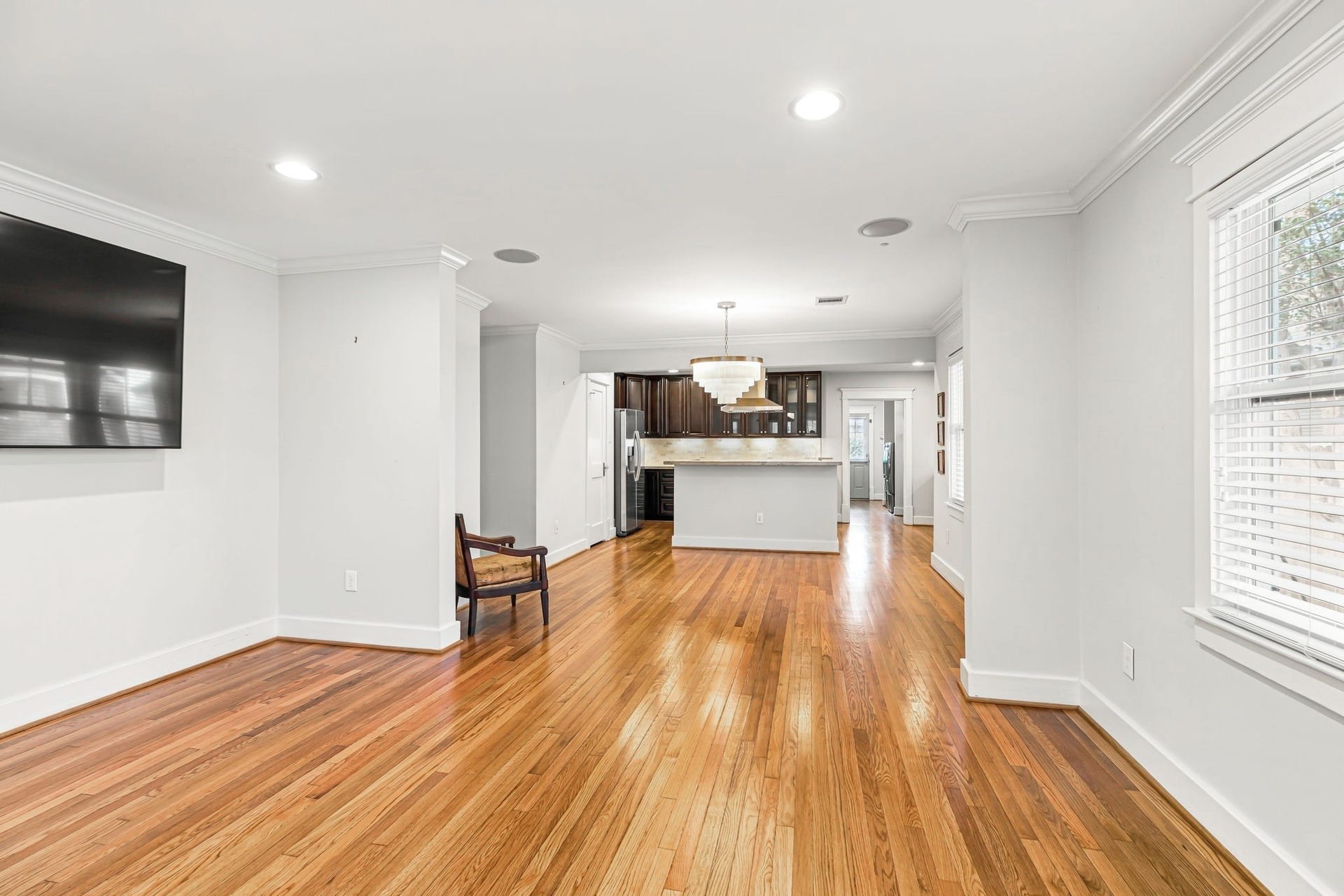 1329 Lawrence Street, Houston, TX 77008 Living room with high ceilings fully open to the kitchen.