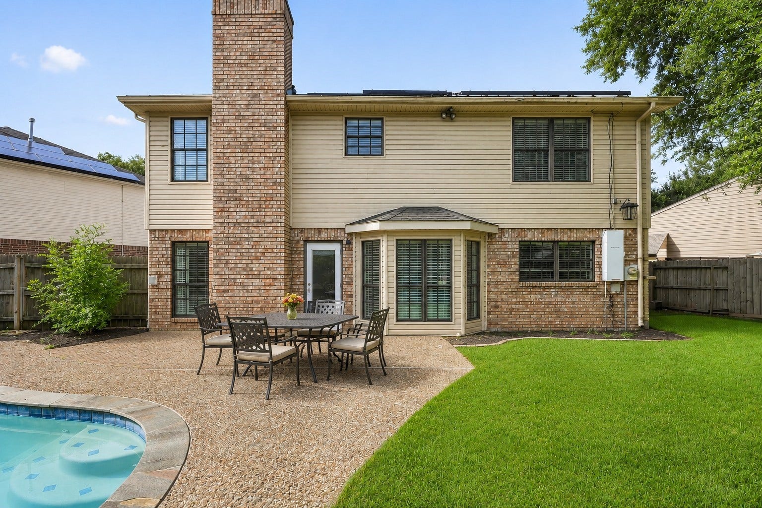3311 Richmond Ferry Court, Richmond, TX 77406 Virtually Cleaned: A generous patio provides room for outdoor seating and entertaining.