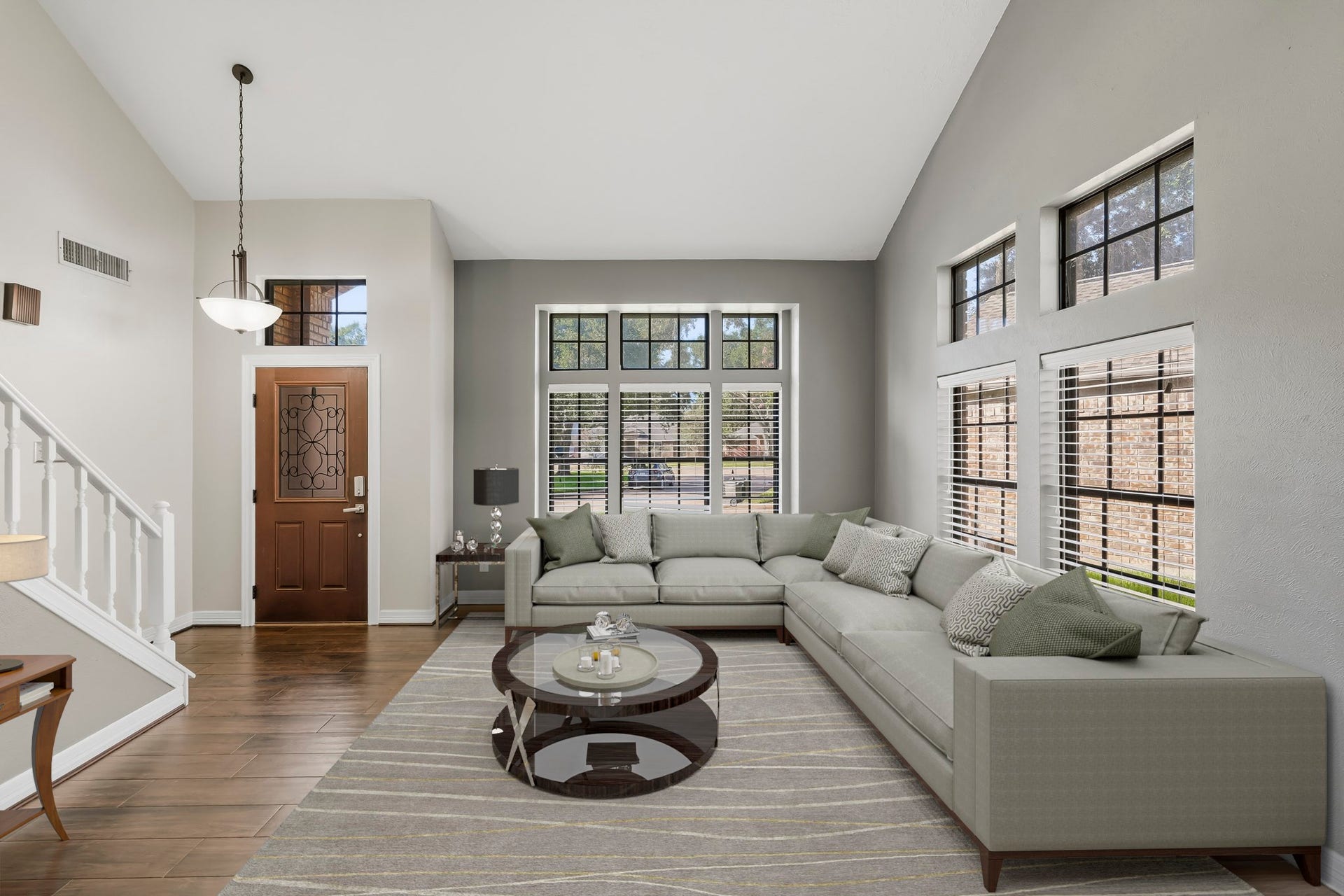 3311 Richmond Ferry Court, Richmond, TX 77406 Virtually Staged: The open living room provides plenty of room for a generous seating arrangement, while the neutral finishes create a bright, versatile space ideal for relaxing or entertaining.