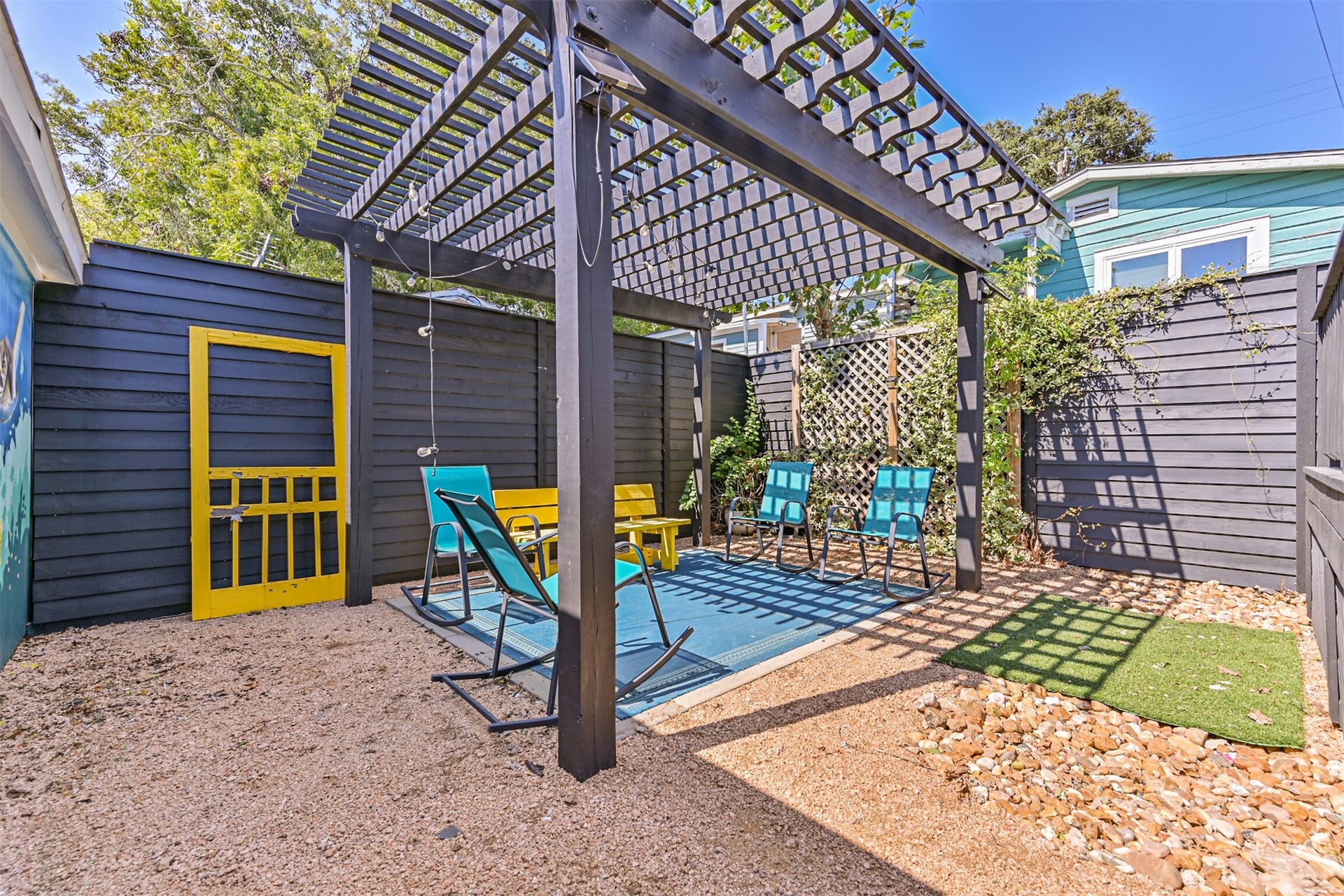 1419 39th Street, Galveston, TX 77550 Another View of the Low Maintenance Yard - Complete with a Small Patch of Grass, Perfect for Confined Animal Visits to the Backyard Area!