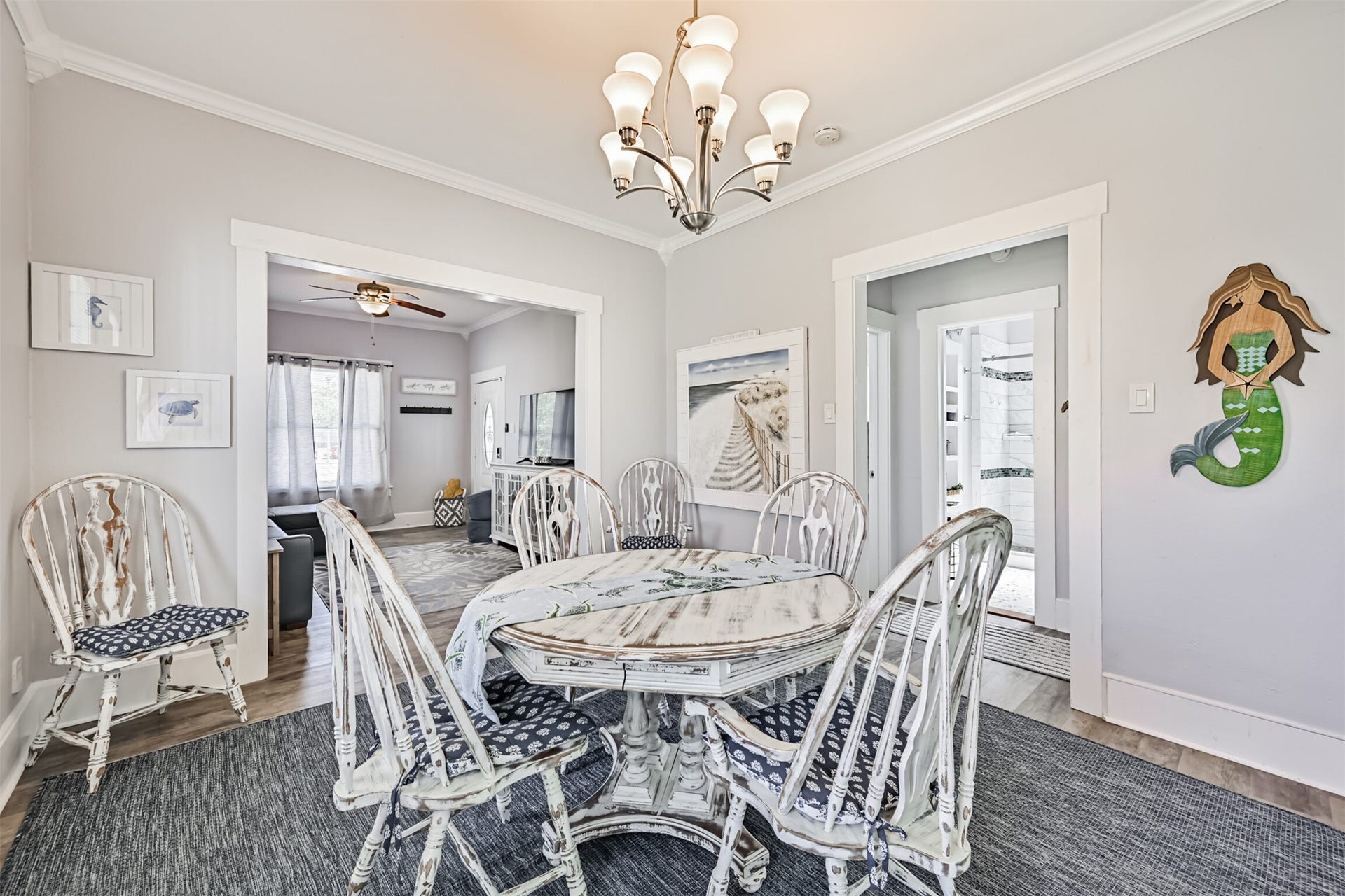 1419 39th Street, Galveston, TX 77550 This Angle Shows the Relationship Between the Dining and Living Rooms, With a Peek into the Hall Area with the Bathroom and Two Bedrooms!