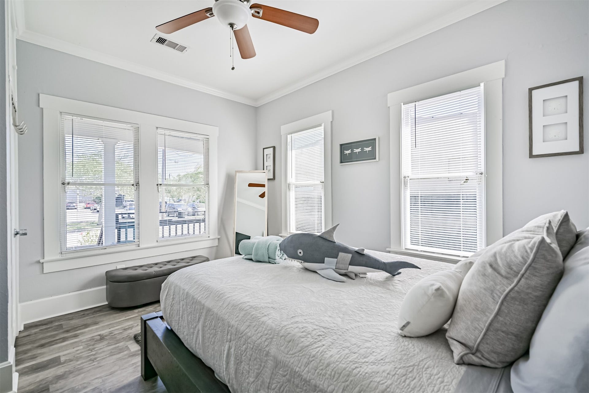 1419 39th Street, Galveston, TX 77550 Bedroom 1 is Fresh with Neutral Colors - Located at the Front of the Home. Lots of Light from Large Windows!