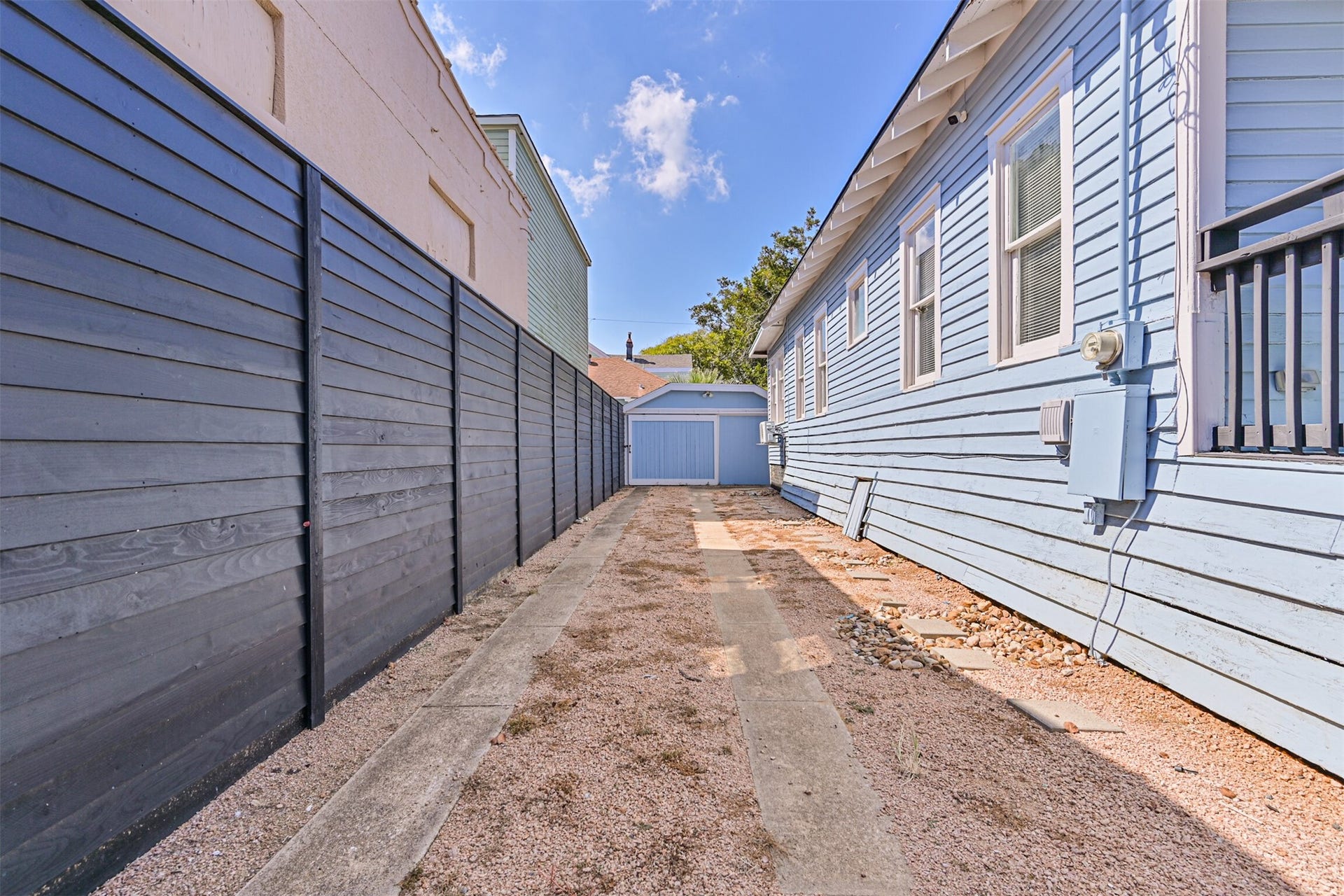 1419 39th Street, Galveston, TX 77550 This Long Driveway and Garage is Perfect for Off-Street Parking for Multiple Vehicles!