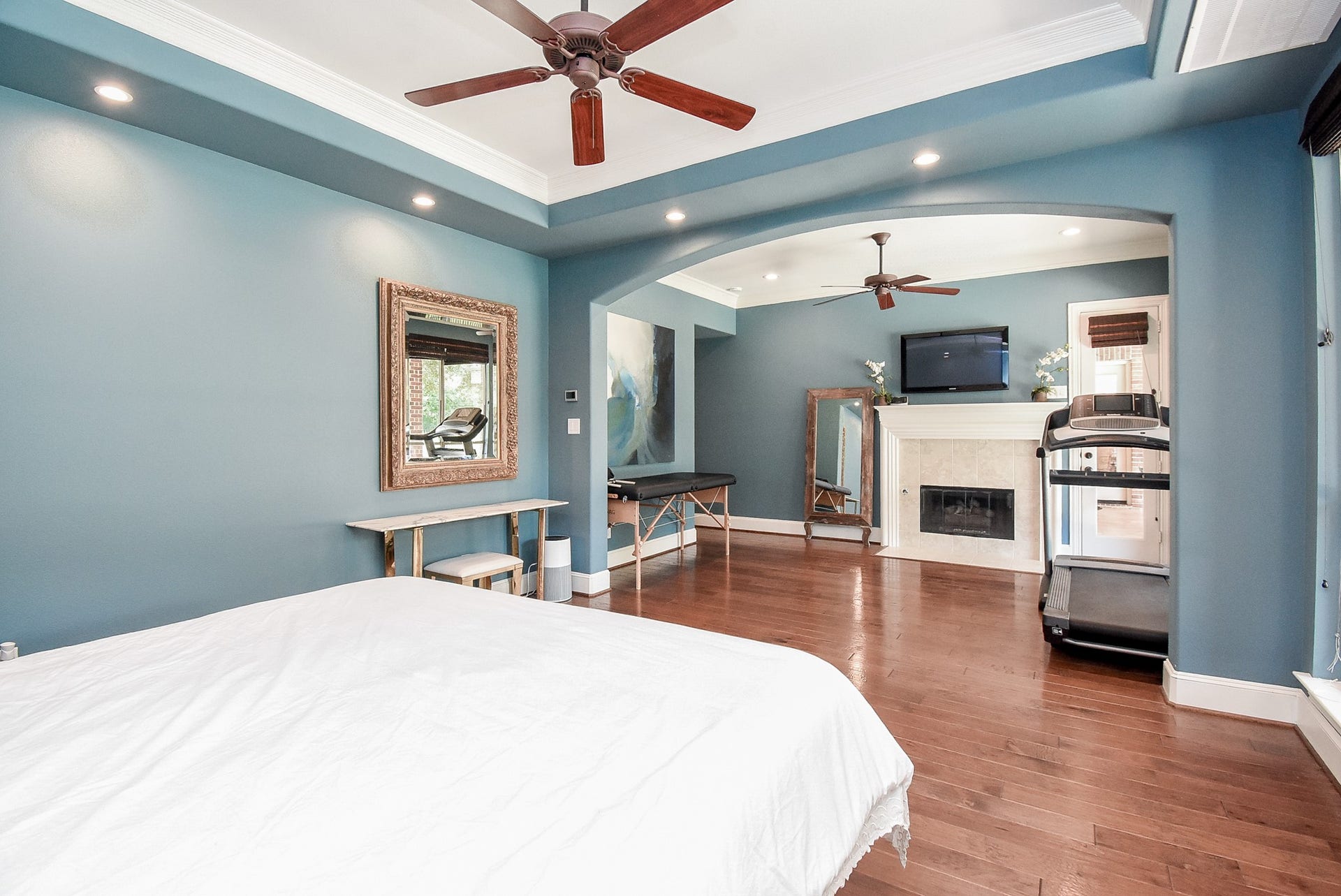 The fireplace creates a cozy sitting area. Entry door provides access to the covered patio.